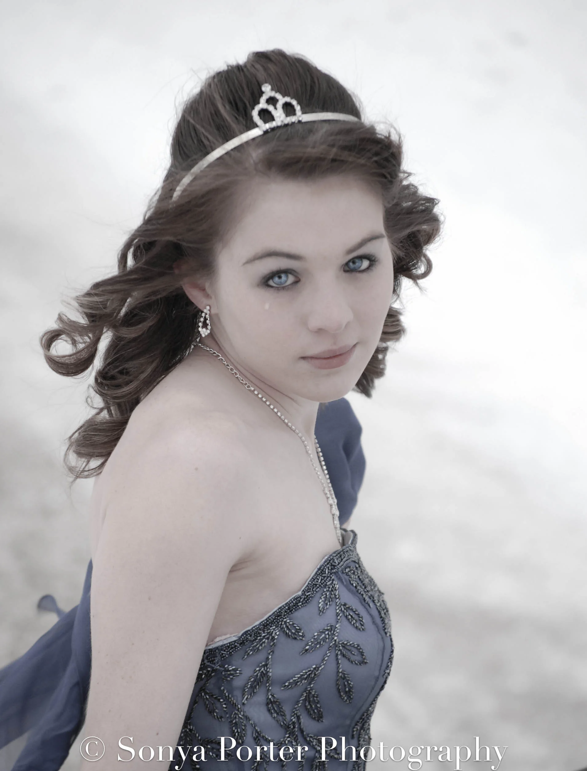 The young lady featured here, whom I refer to as "Cinderella", is a natural in front of the camera. She was a joy to photograph and was nice enough to pose in the freezing cold! That is a tear from being cold! 
