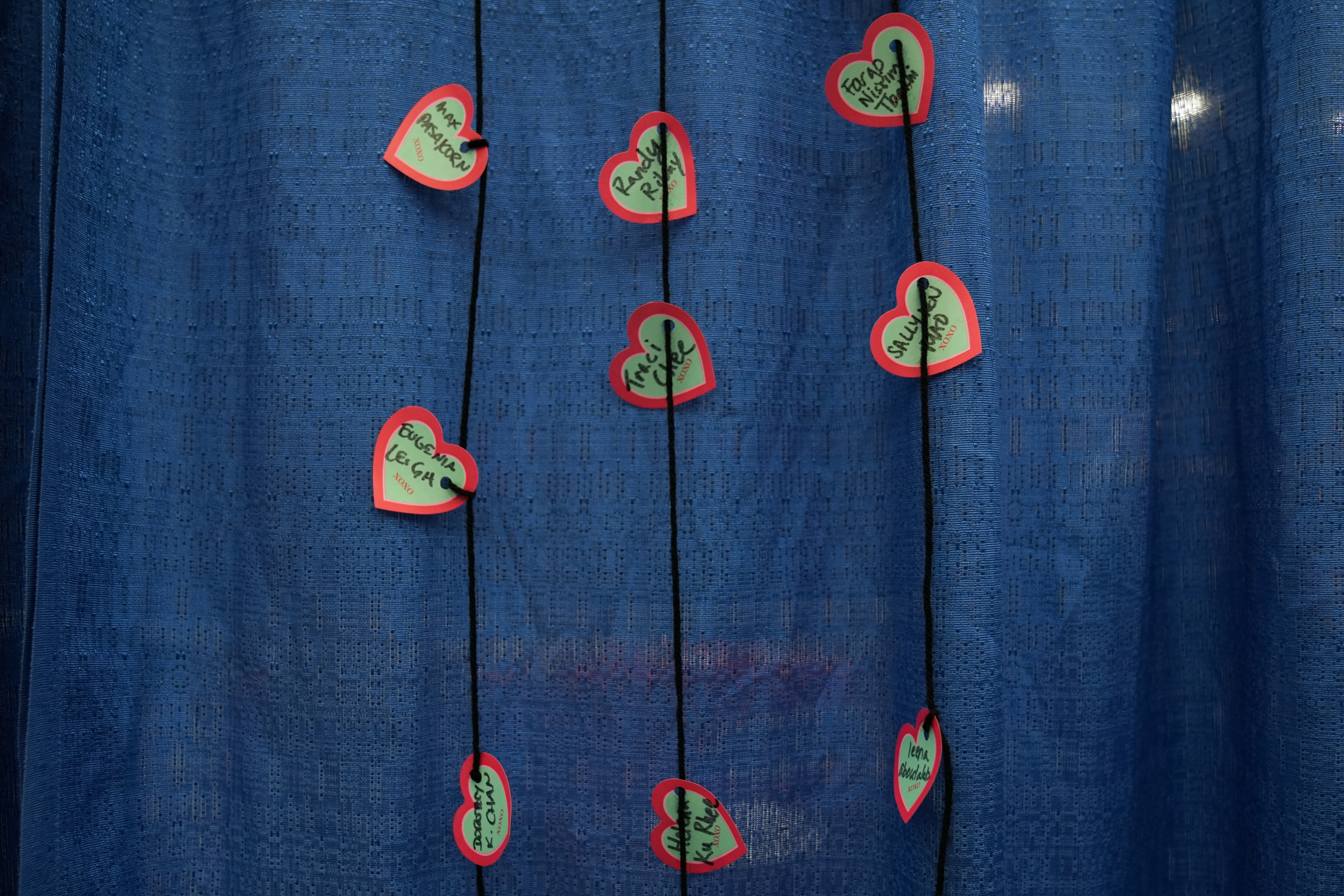 Paper hearts featuring names of AAPI writers.