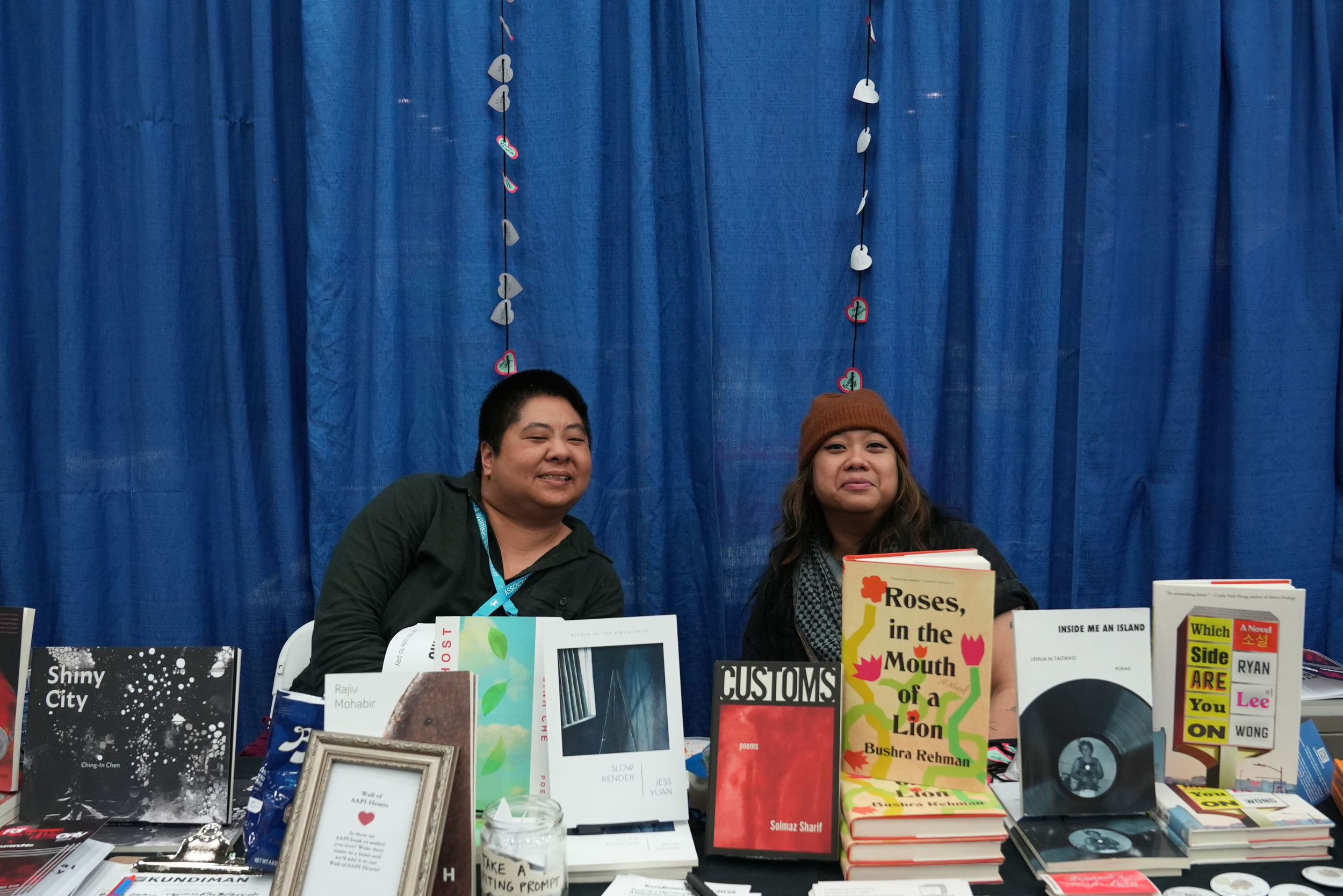 Ching-In Chen and Ina Cariño at the Kundiman booth