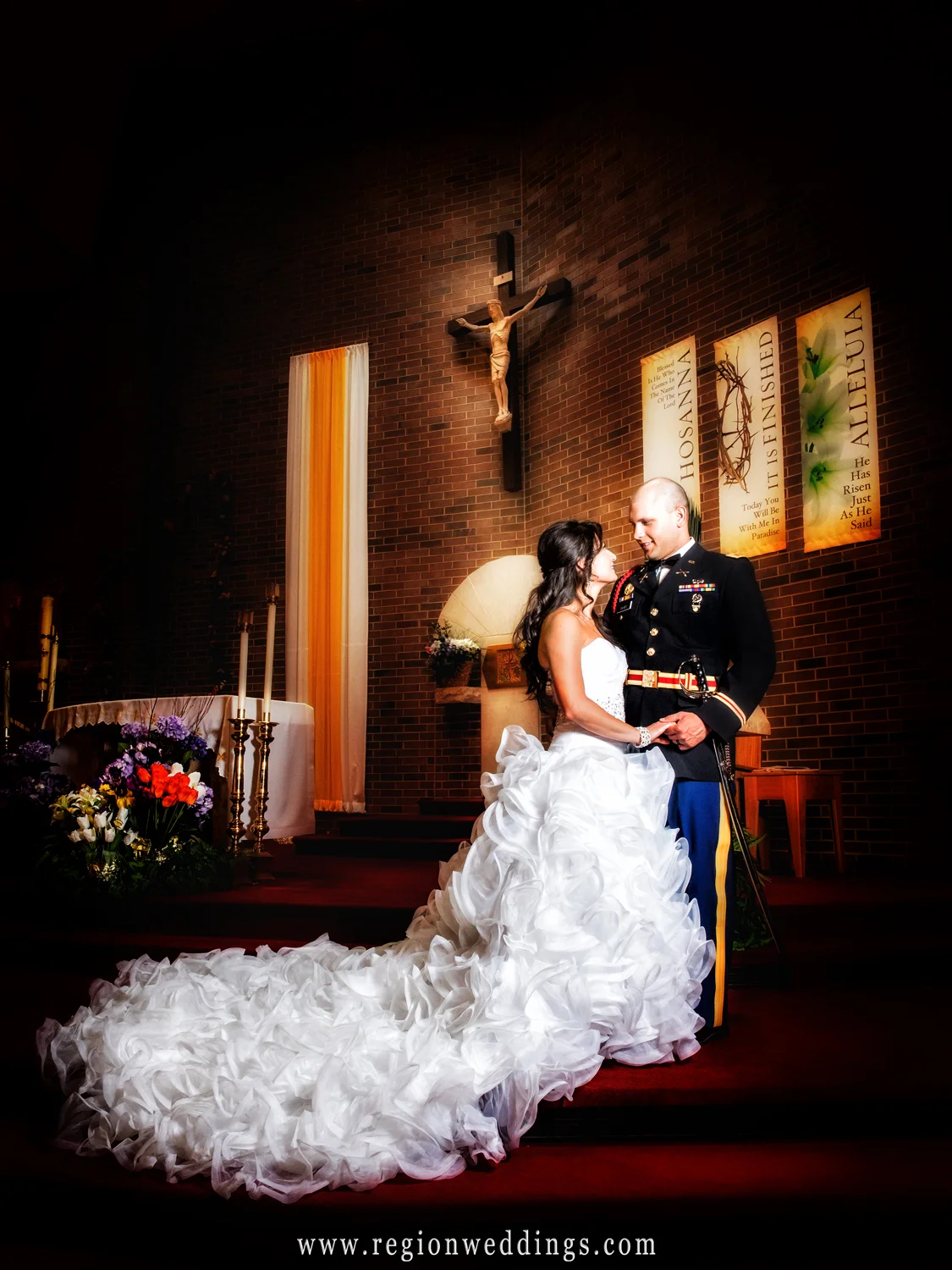The bride and groom look at each other at the altar of Saint Matthias Church.