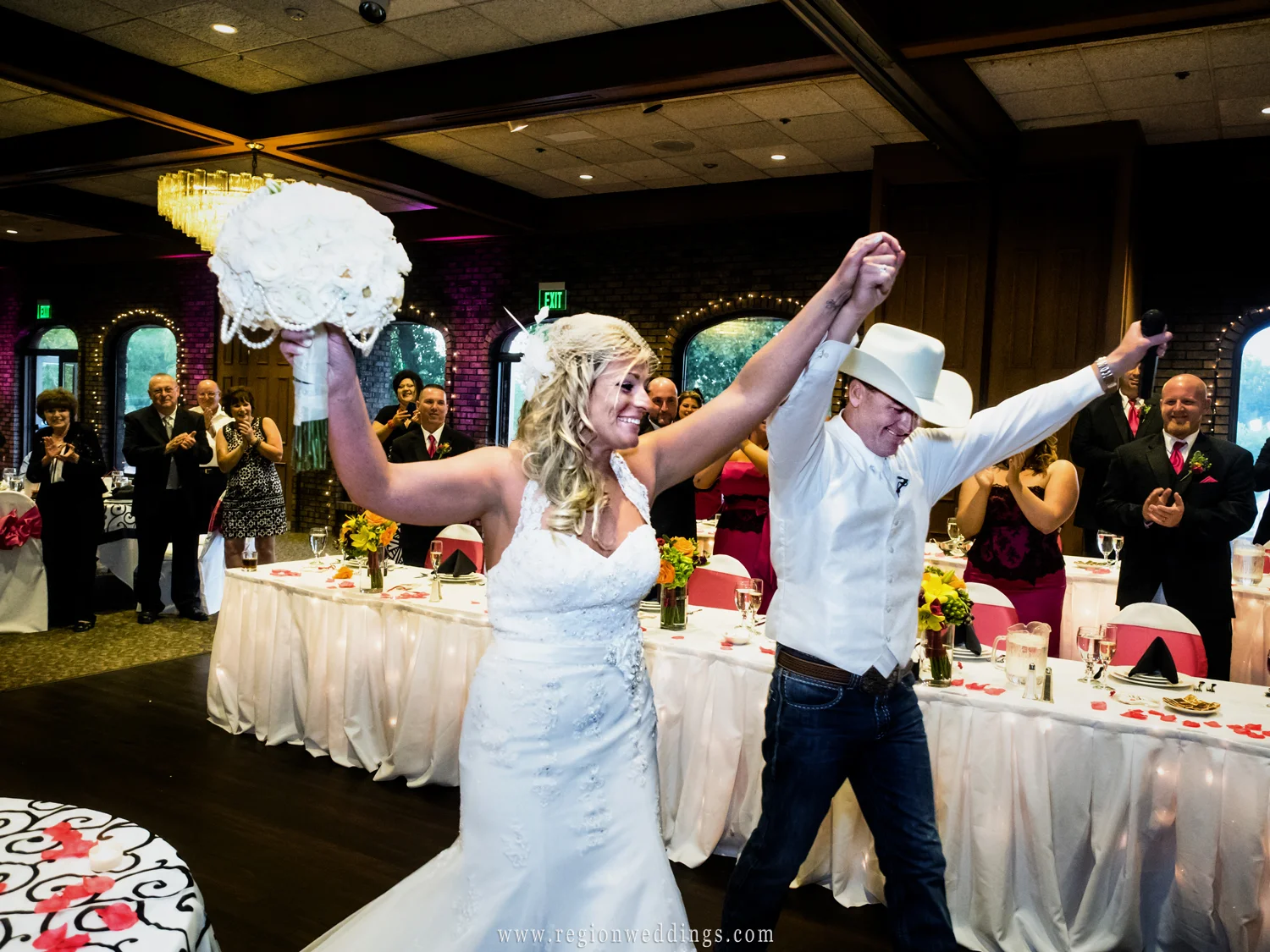Groom introduces his bride at Wicker Park Social Center in Munster, Indiana.