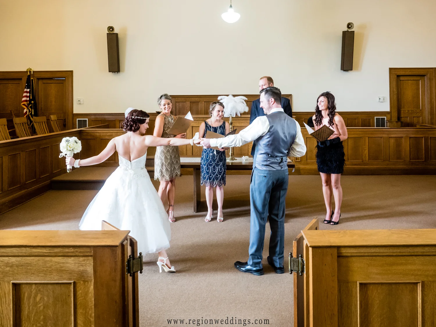 The bride and groom dance at their Crown Point wedding ceremony inside the 3rd floor courtroom.