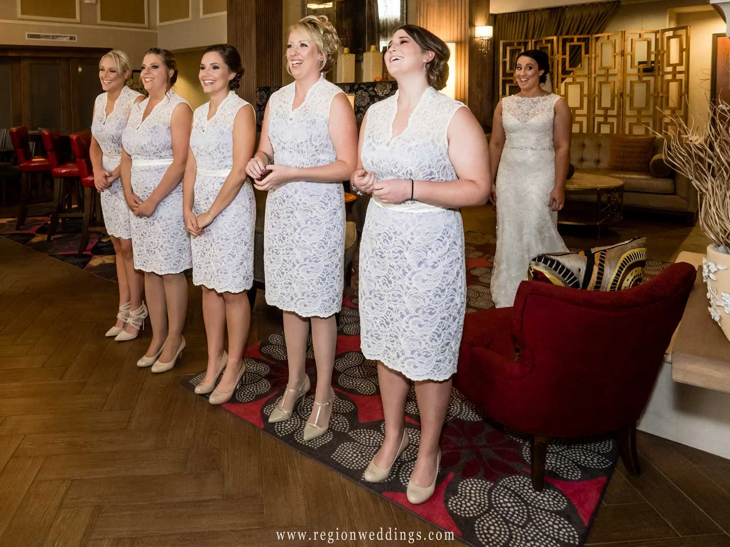 First look at the bride for her bridesmaids.