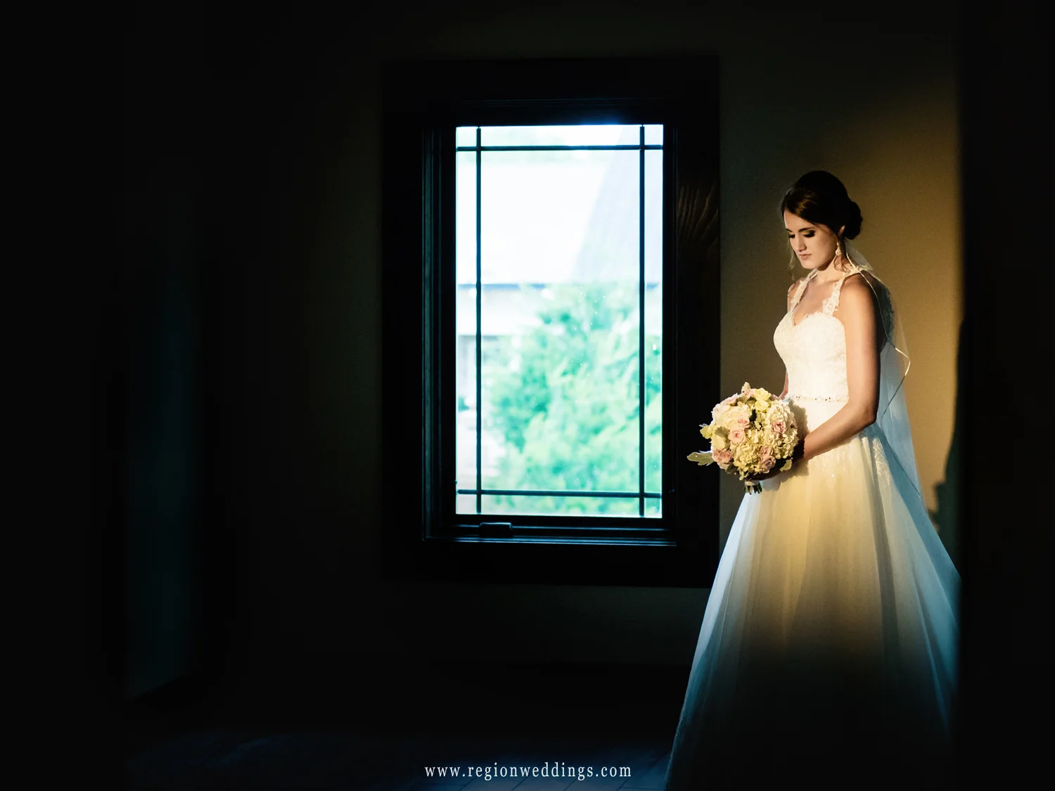 Bride alone on the second floor of the bridal suite at Sandy Pines.
