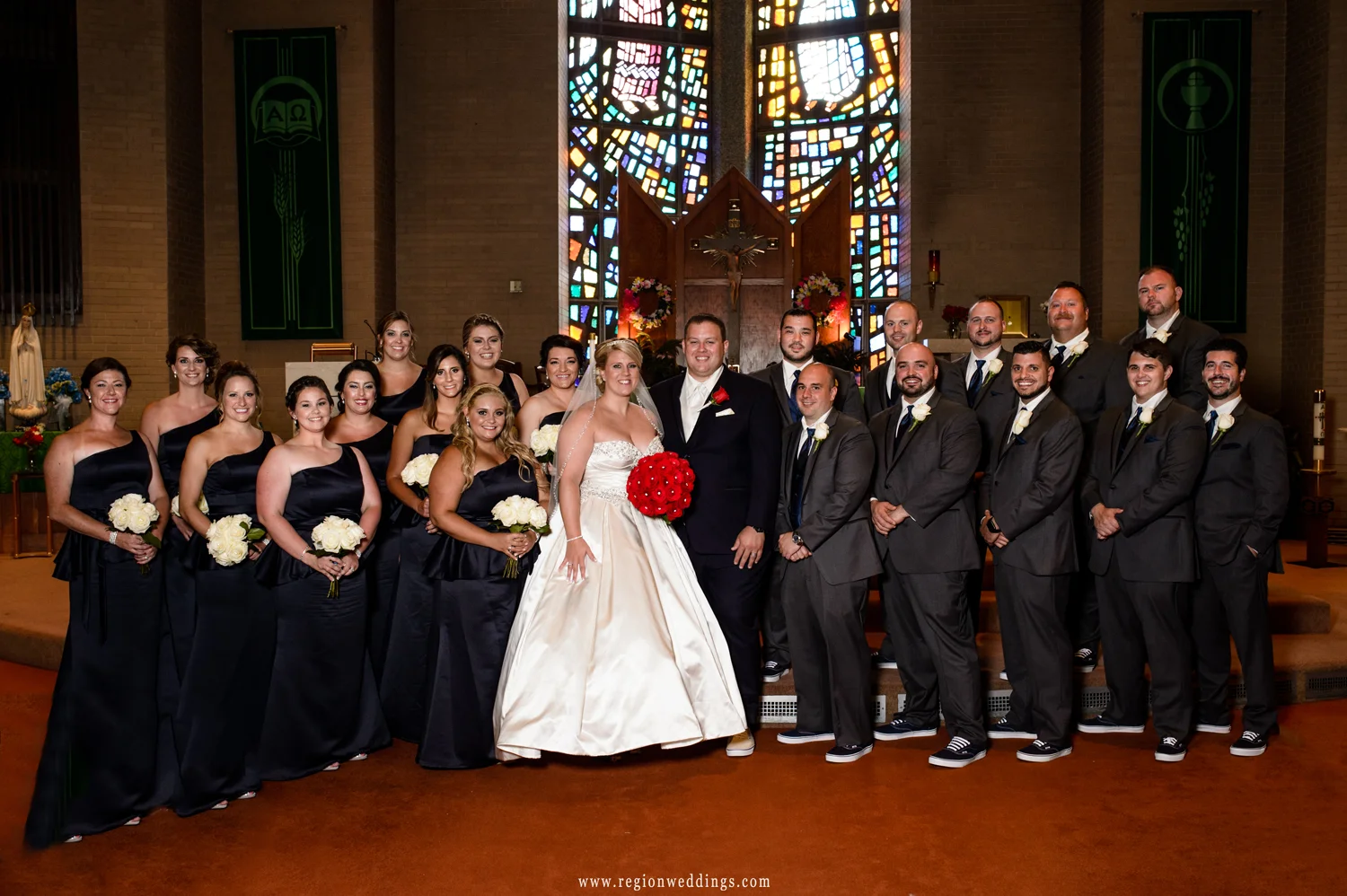 Wedding party at the altar of Annunciata Church.