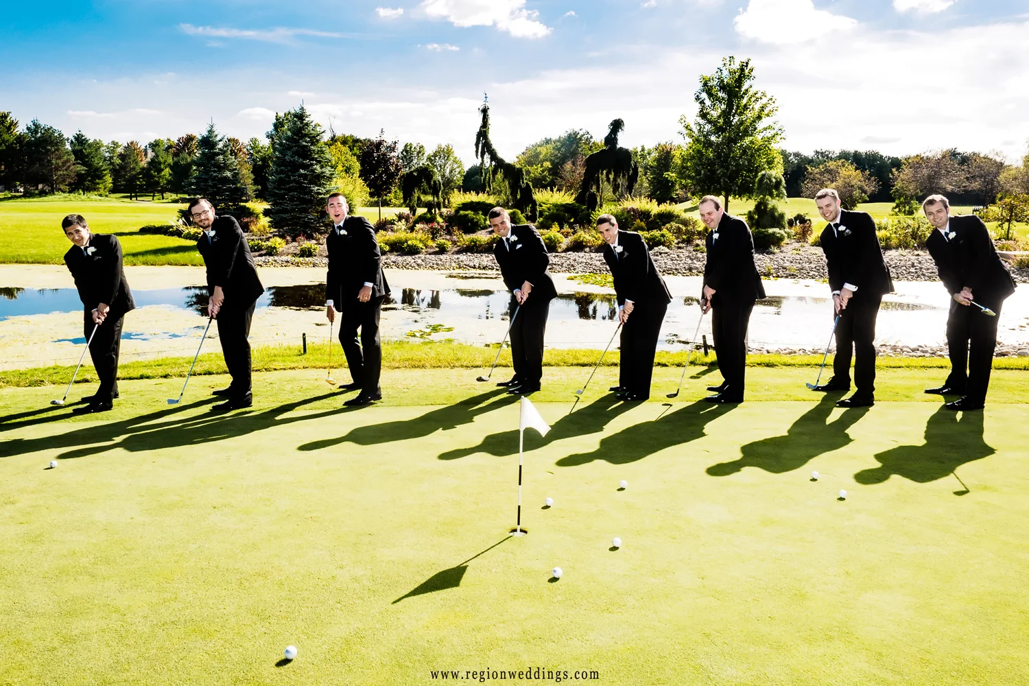 The groomsmen hit the green at White Hawk golf course.