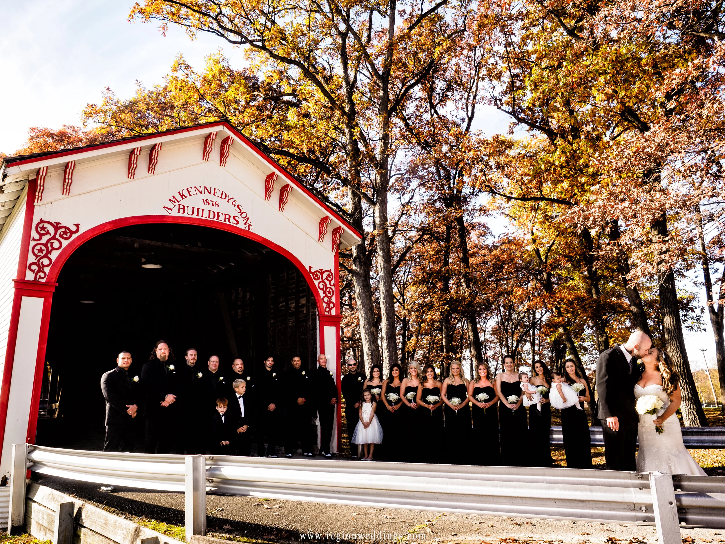 Wedding party at Lake County Fairgrounds by the old covered bridge.