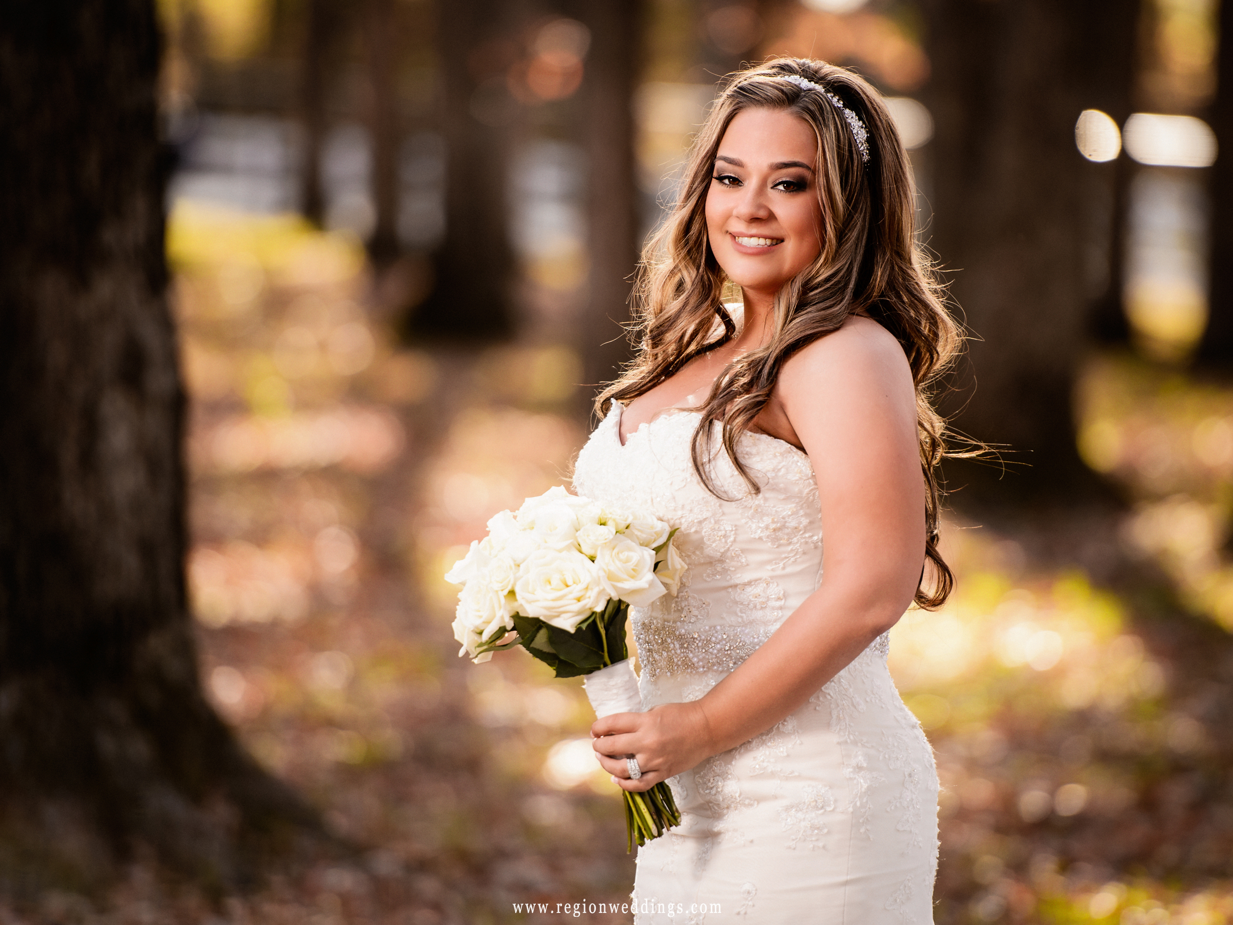 Beautiful bride surrounded by Fall color.