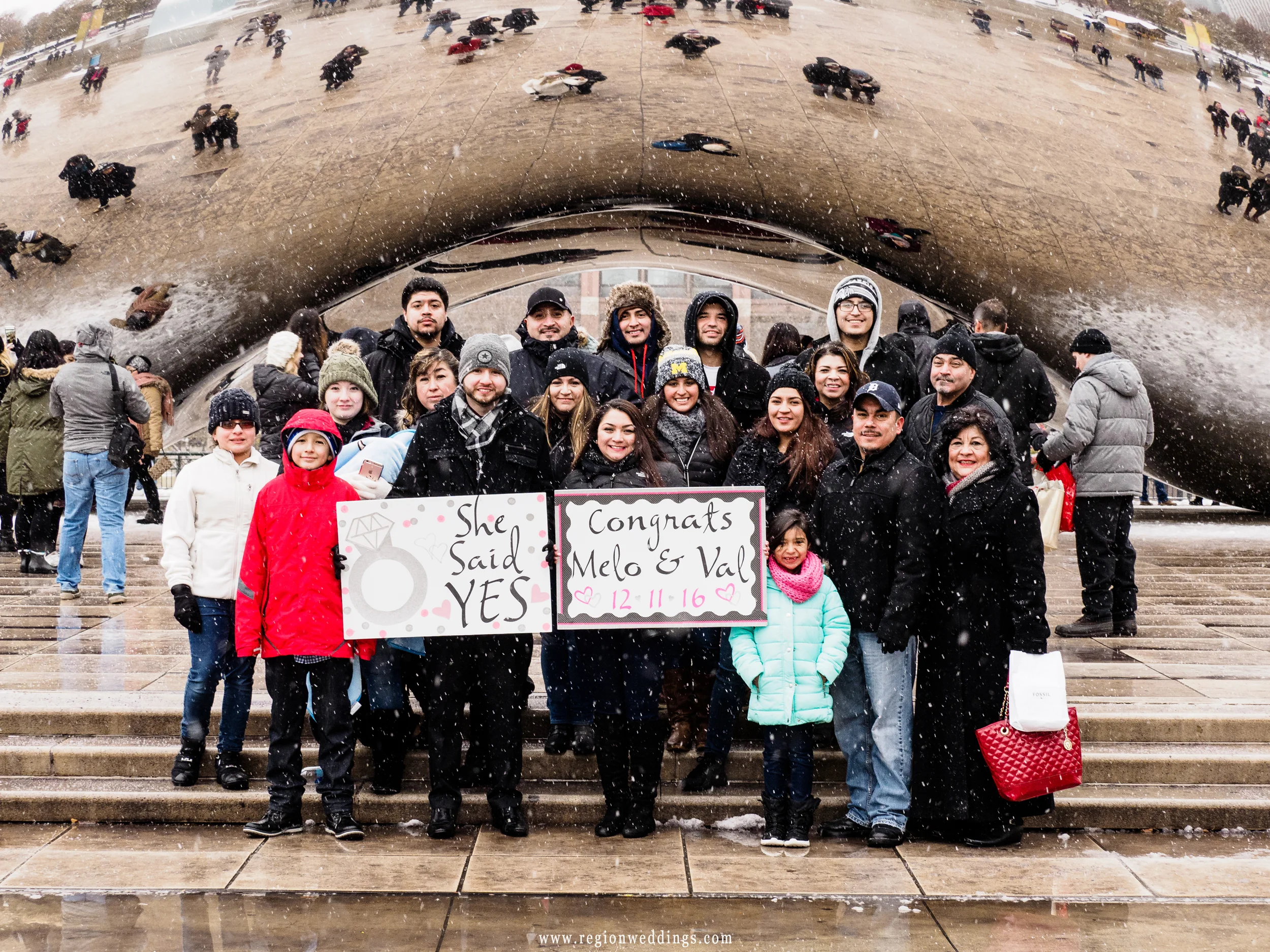 Family photo with a newly engaged couple after a marriage proposal.