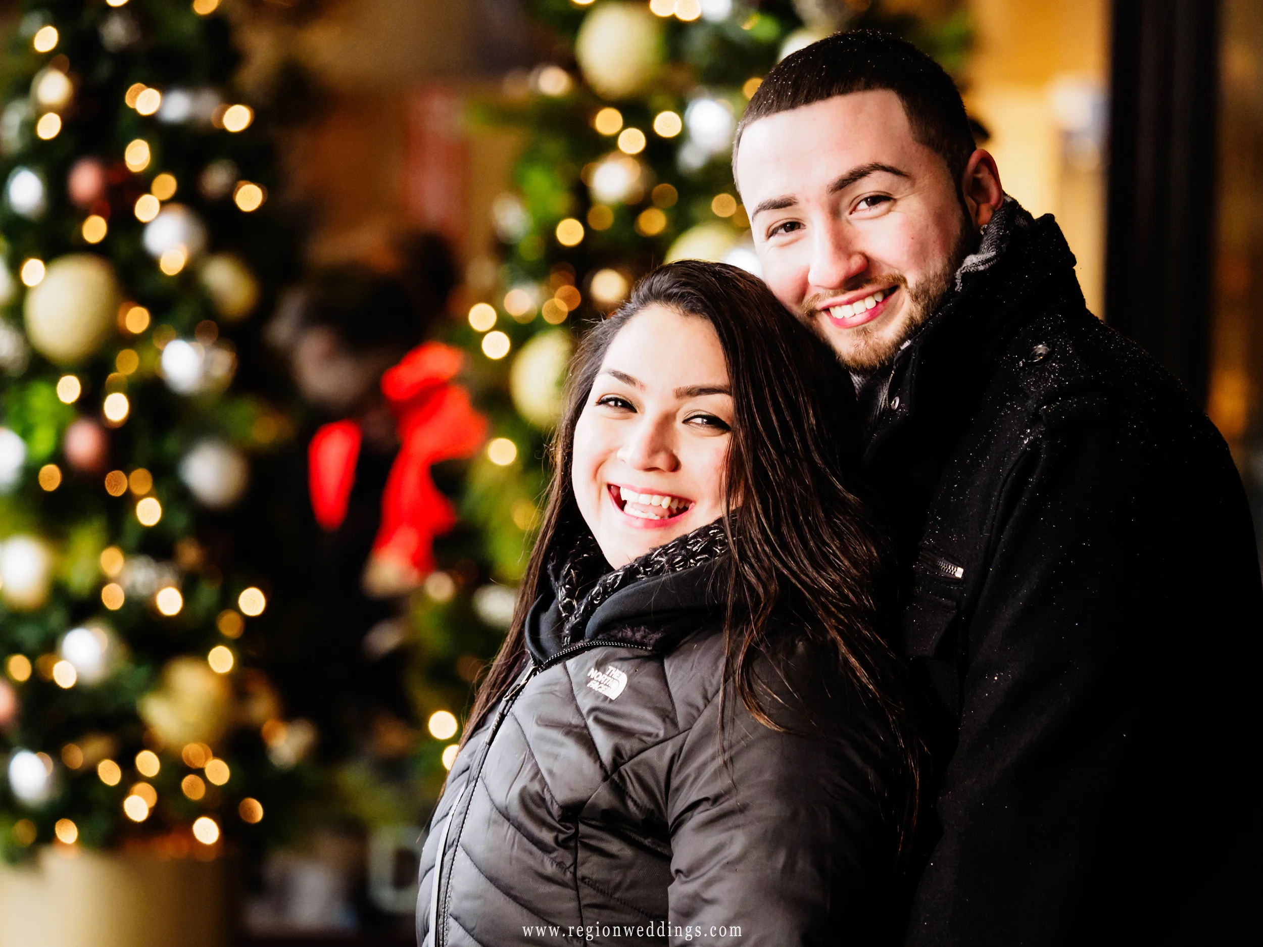Holiday portrait of the newly engaged couple.