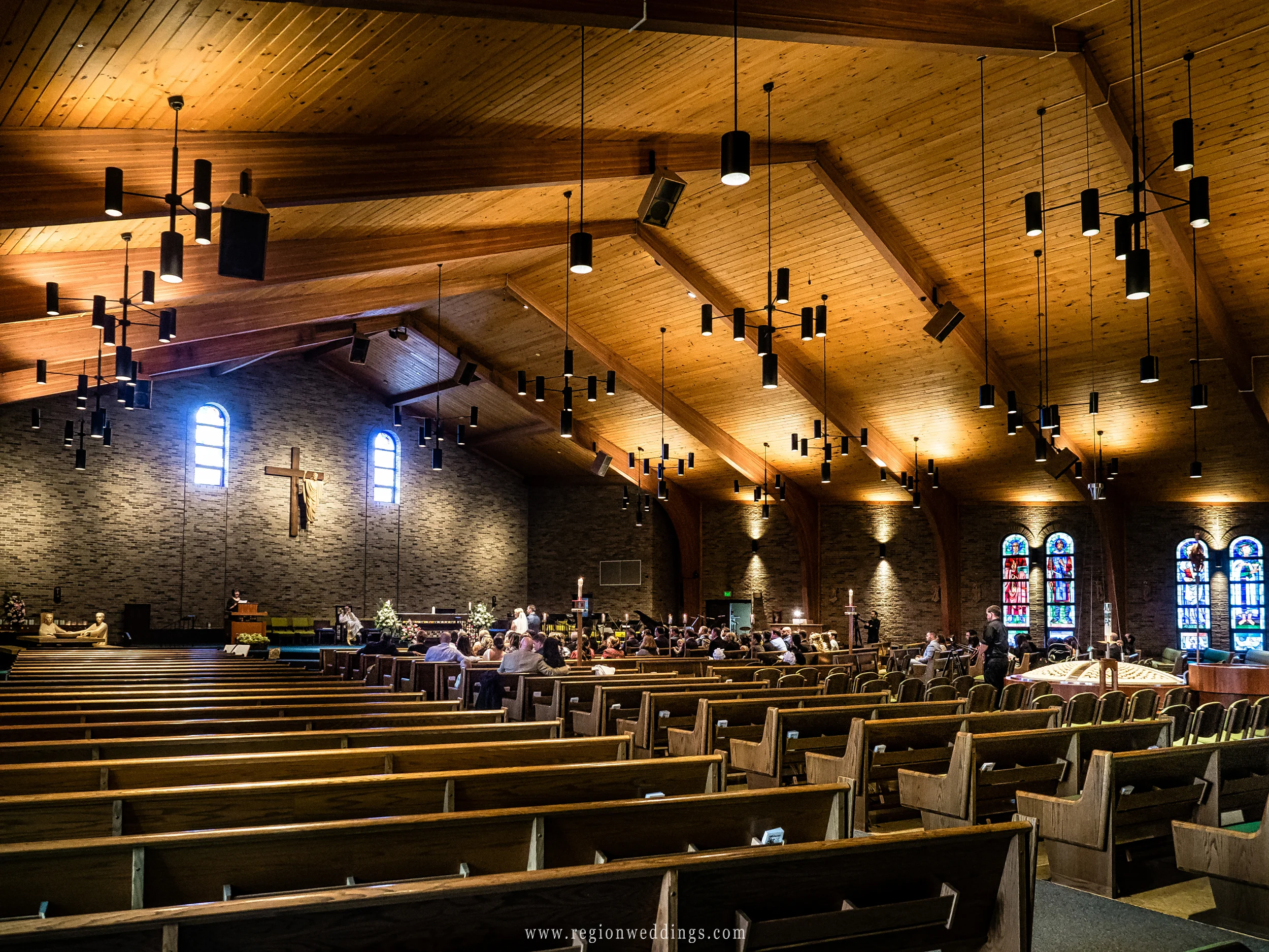 A reader speaks at a wedding ceremony at St. Maria Goretti.