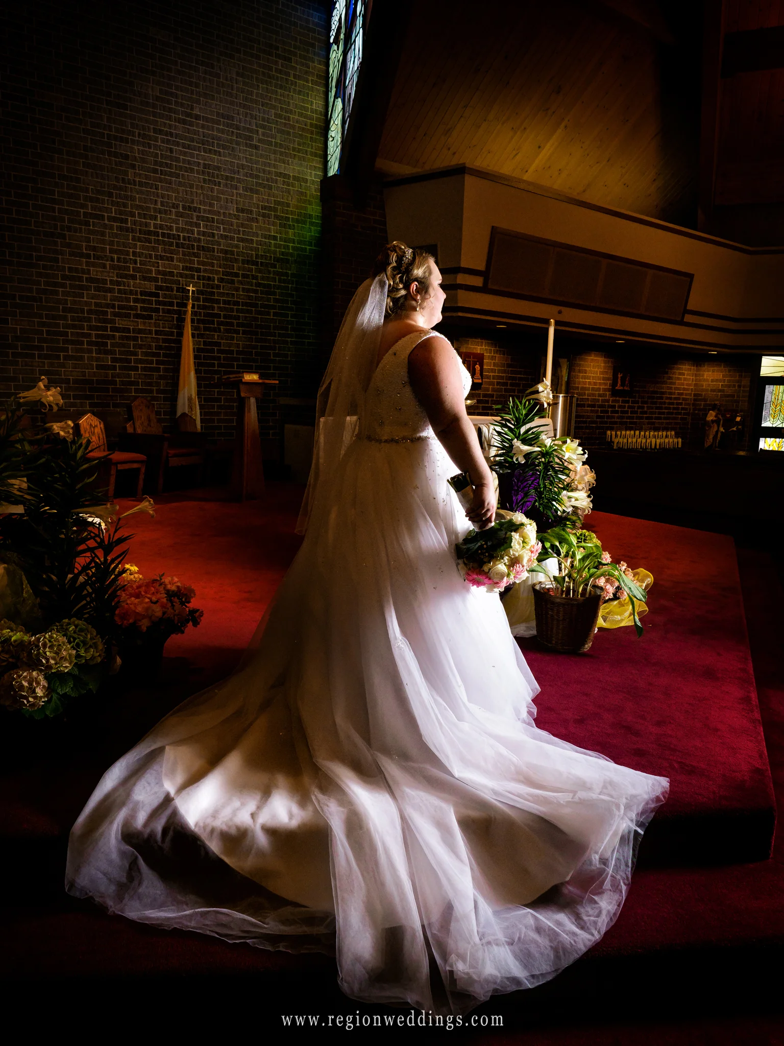 Beautiful bride on the altar at St. James the Less Catholic Church.