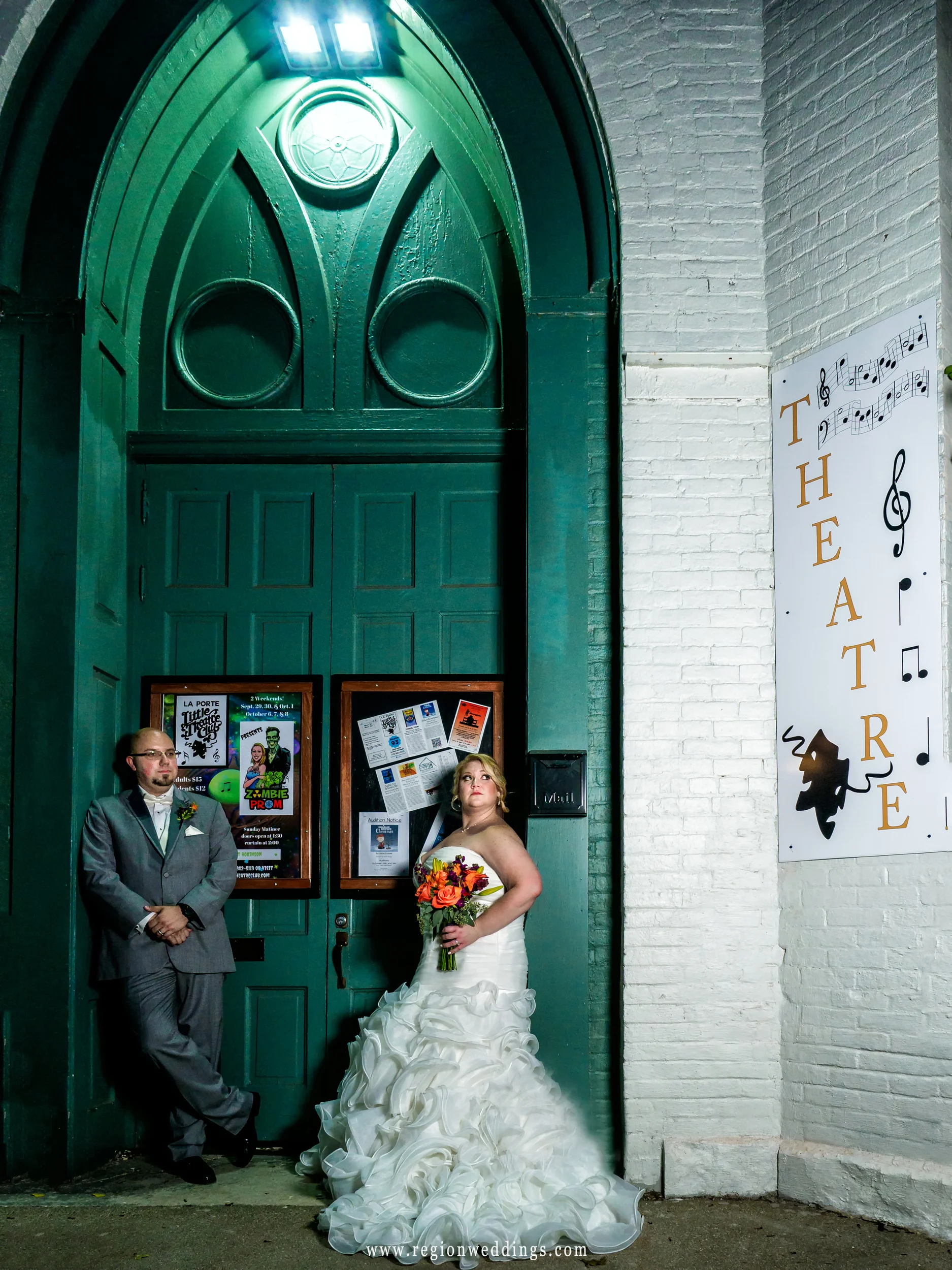 Bride and groom looking rad in front of The Laporte Little Theatre Club.