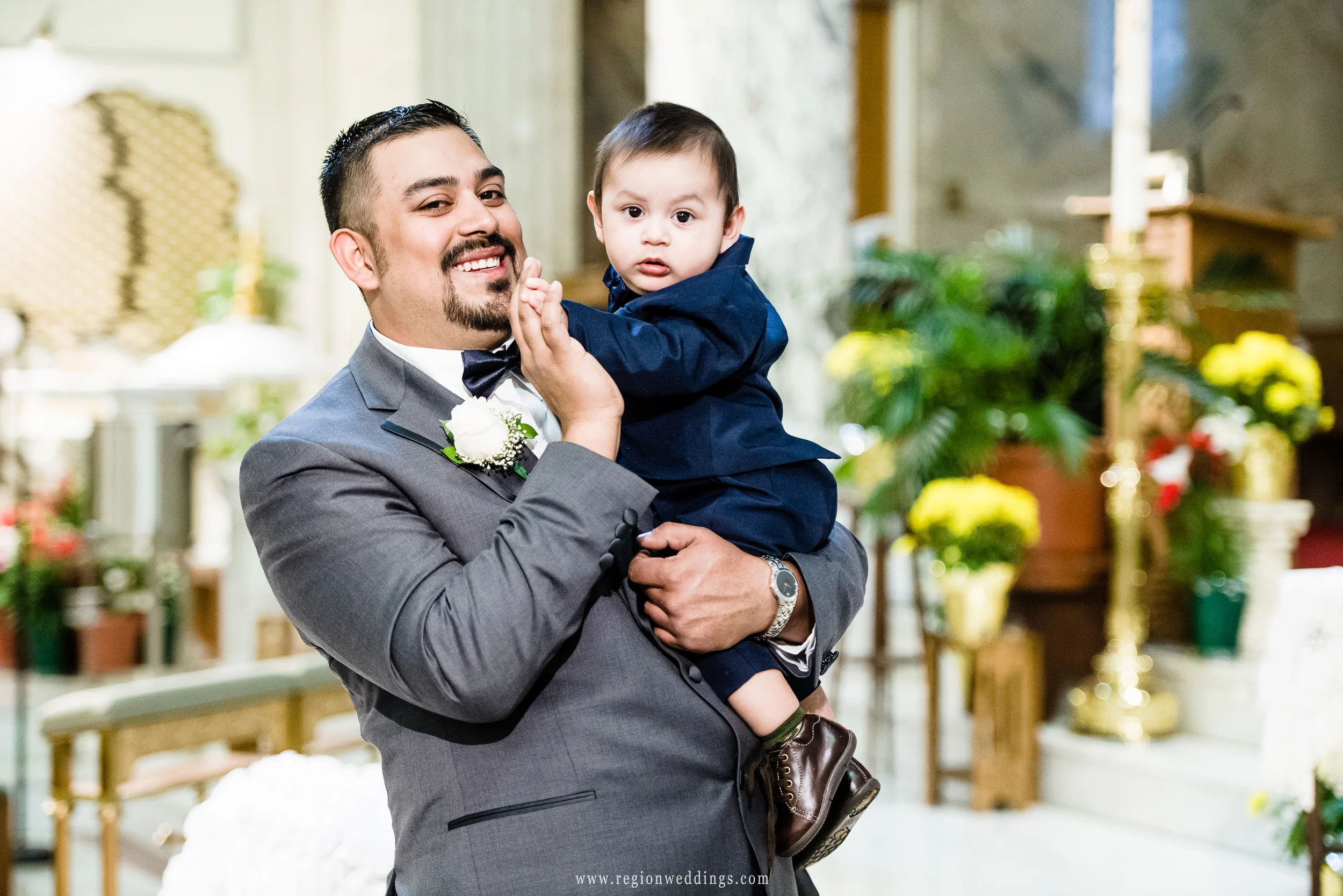The groom with his son at church.