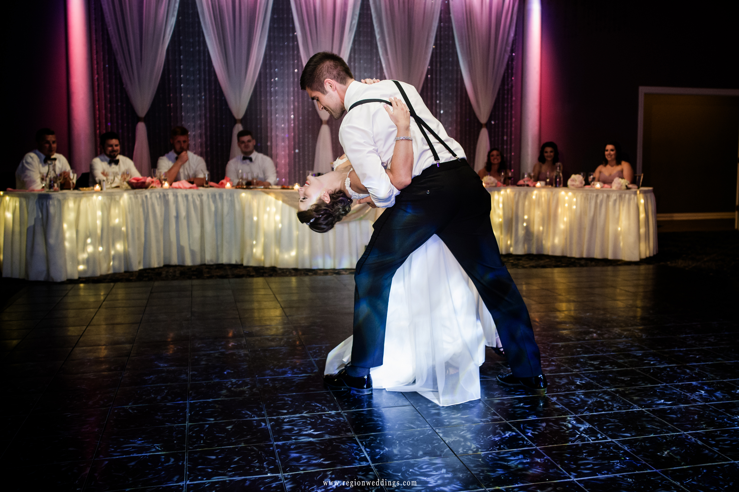 The groom dips his bride at Aberdeen Manor in Valparaiso, Indiana.