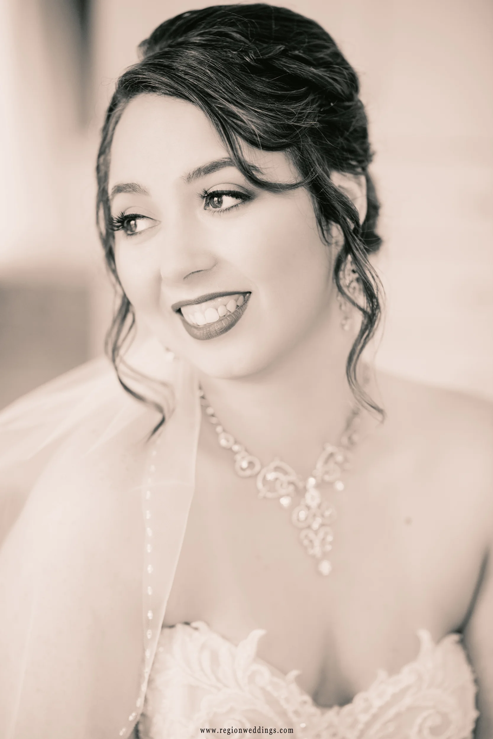 The beautiful bride on her big day in the bridal suite at Lighthouse Restaurant.