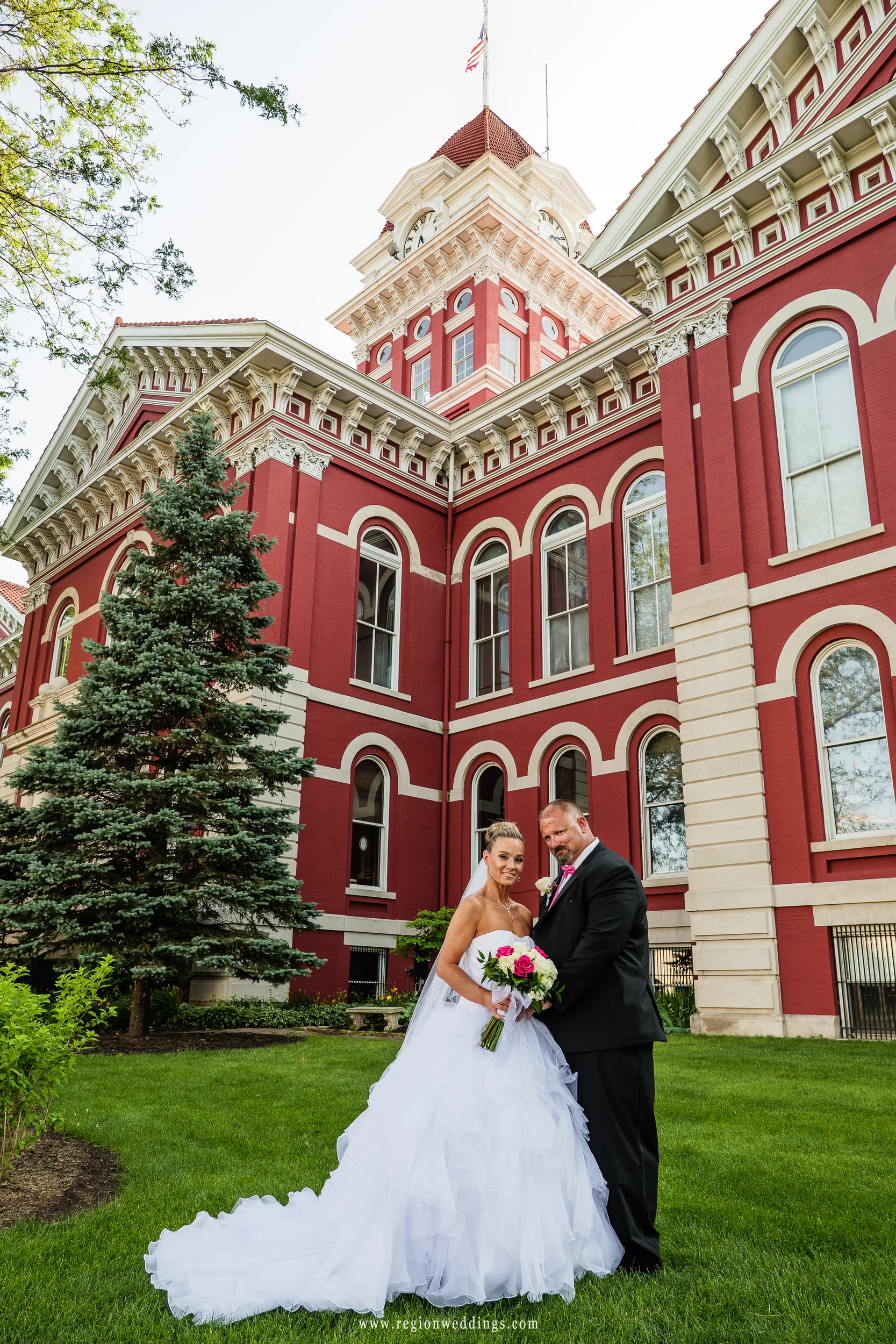 Wedding photo on the lawn of the historic Crown Point Courthouse.