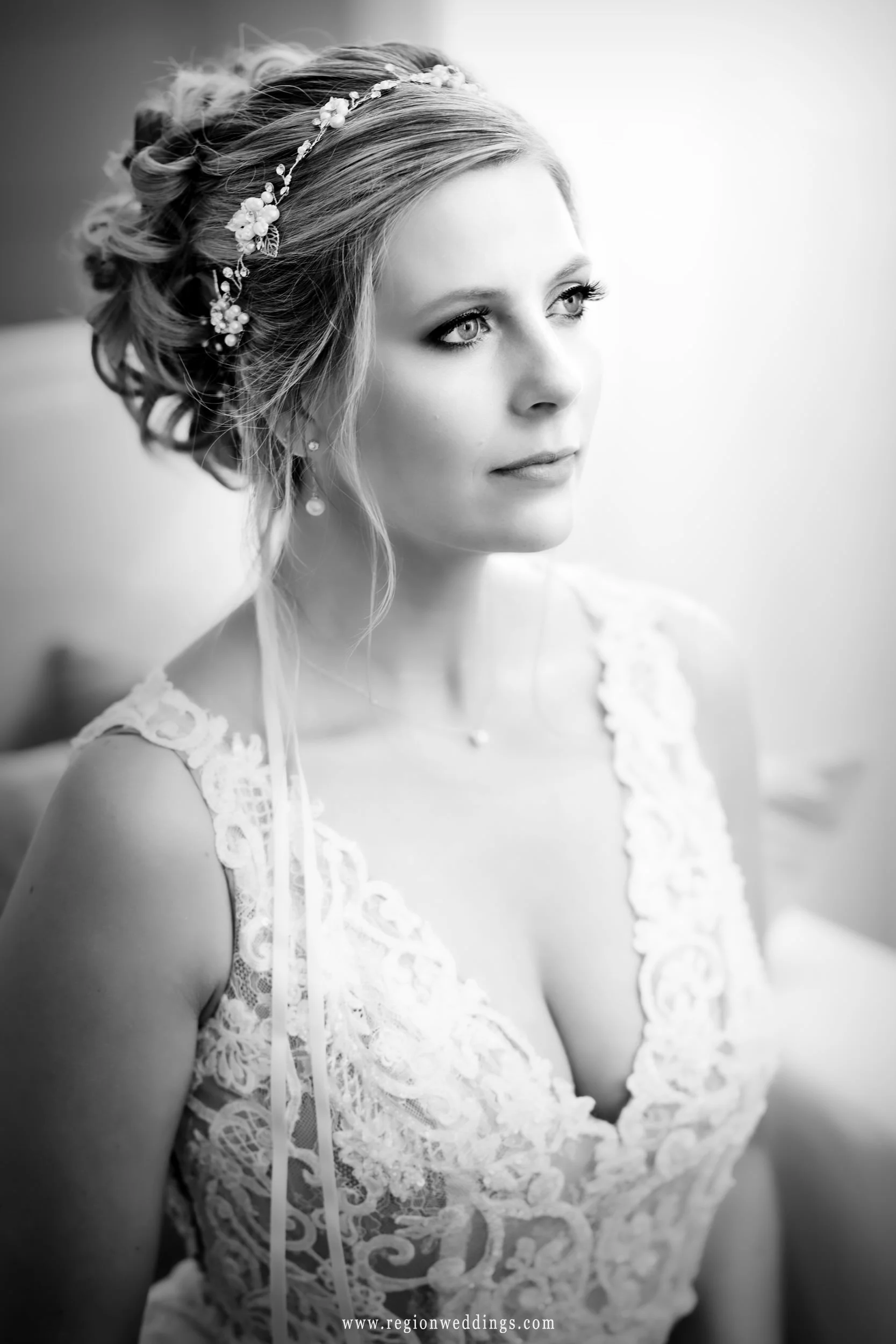 A classic black and white photo of the bride on her wedding day.