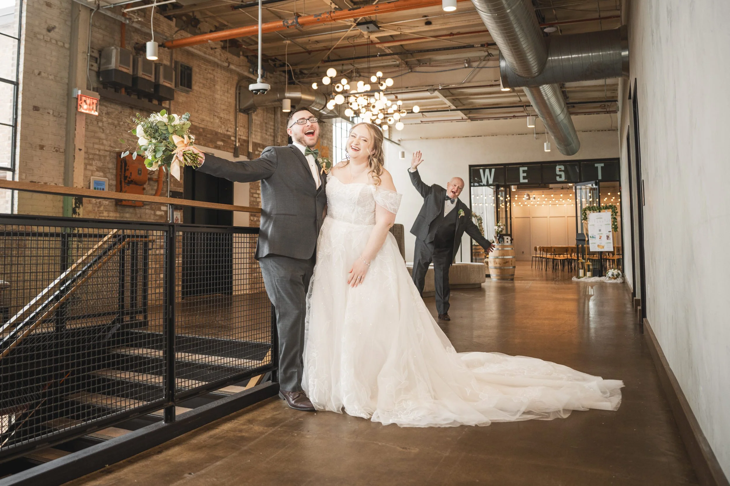 The father of the bride photo bombs the newlyweds on their wedding day.