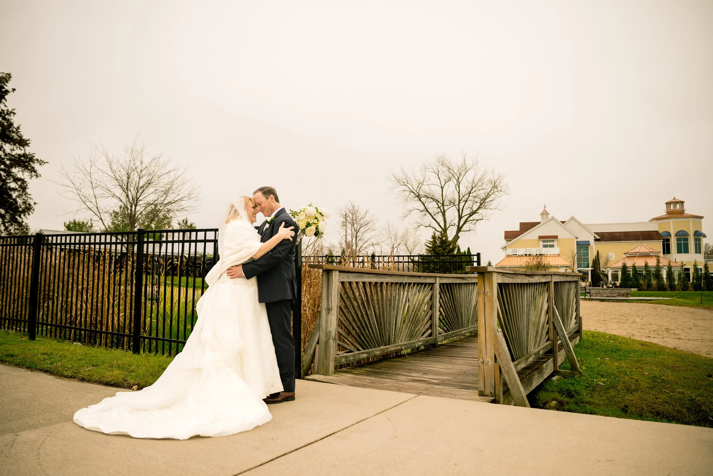 A couple embraces outside of Lighthouse Restaurant.