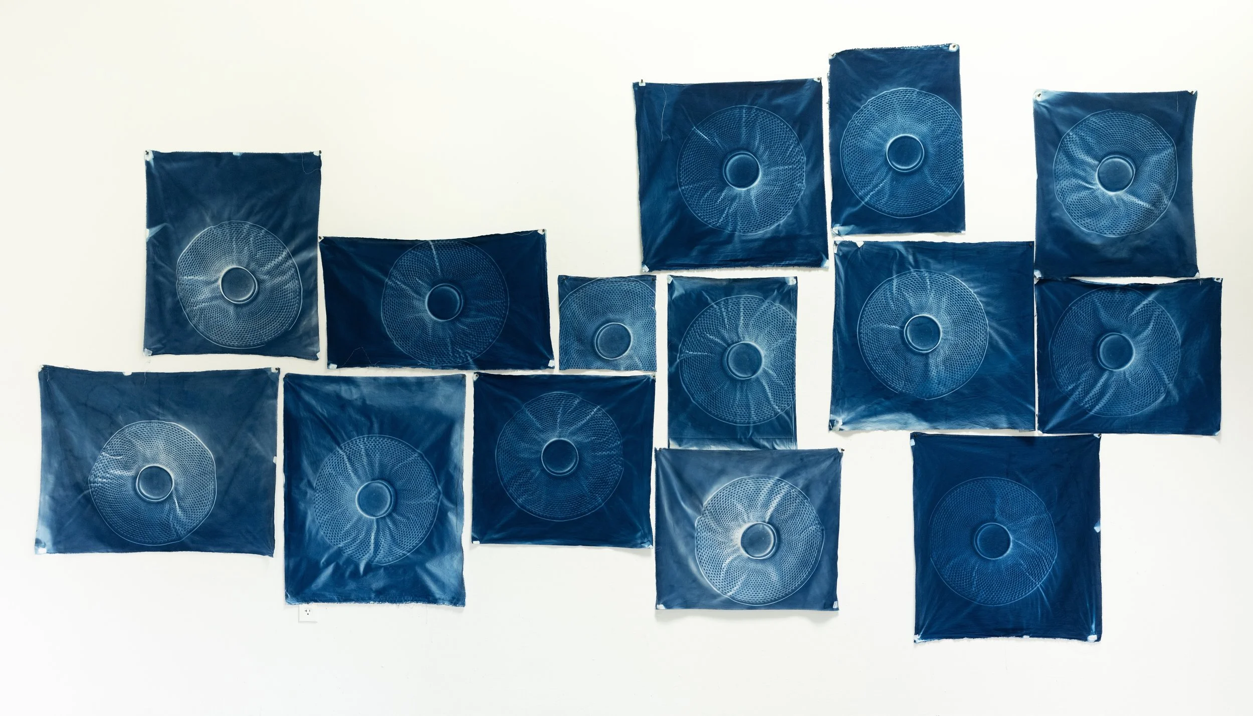   Radial , 2025, cyanotype on upcycled linen and cotton, approximately 6’ H x 14’ W  photo by Barbara Weissberger 