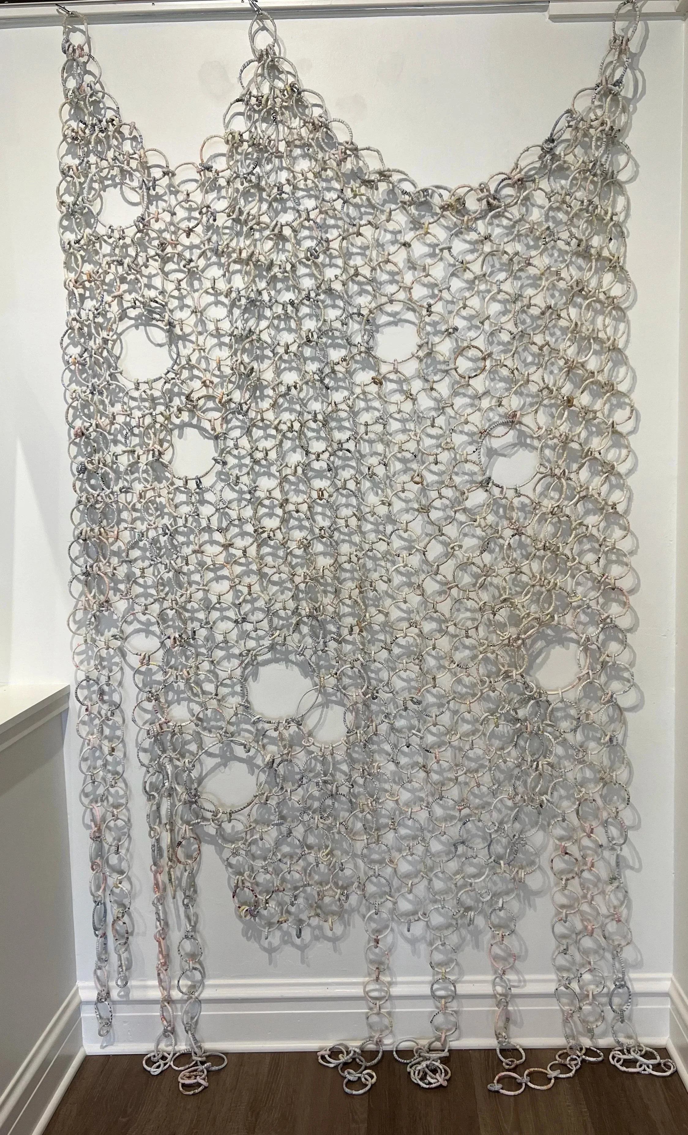   Effervescence   Approx. 7’ H x 3.5’ W  2024  Upcycled clothing, aluminum armature wire, thread 