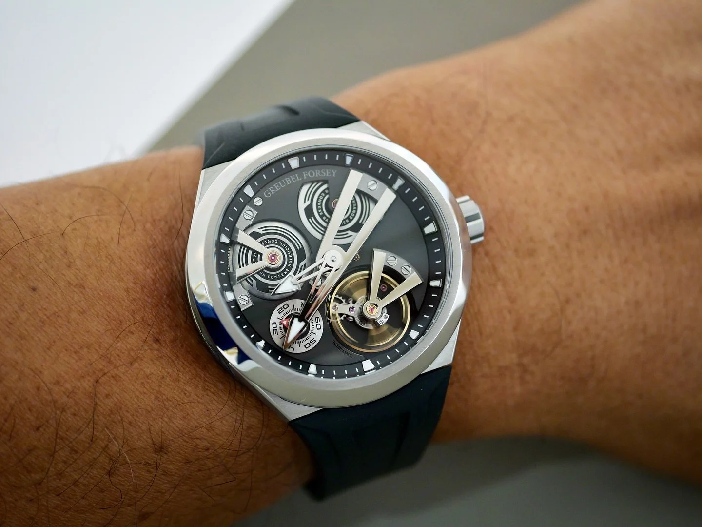The @greubel.forsey Balancier 3 in titanium. This 41.5 mm timepiece is characterized by its three prominent bridges: the first houses the barrel, the second for the large balance wheel, and the third, and most striking of all with its curvature, is a