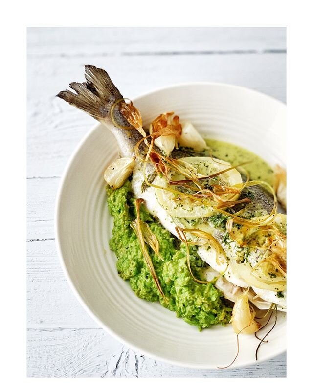 Fish en Papillote with roasted green garlic, with a zingy gooseberry sauce and sweet pea pur&eacute;e. 
It&rsquo;s a very easy lunch to put together and if I sit in the garden with a glass of white wine I can pretend I&rsquo;m on holiday while I&rsqu