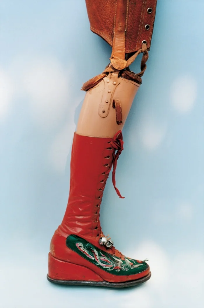 Kahlo’s leg was amputated in 1953. She designed this prosthetic leg with embroidered red lace-up boots and a bell attached