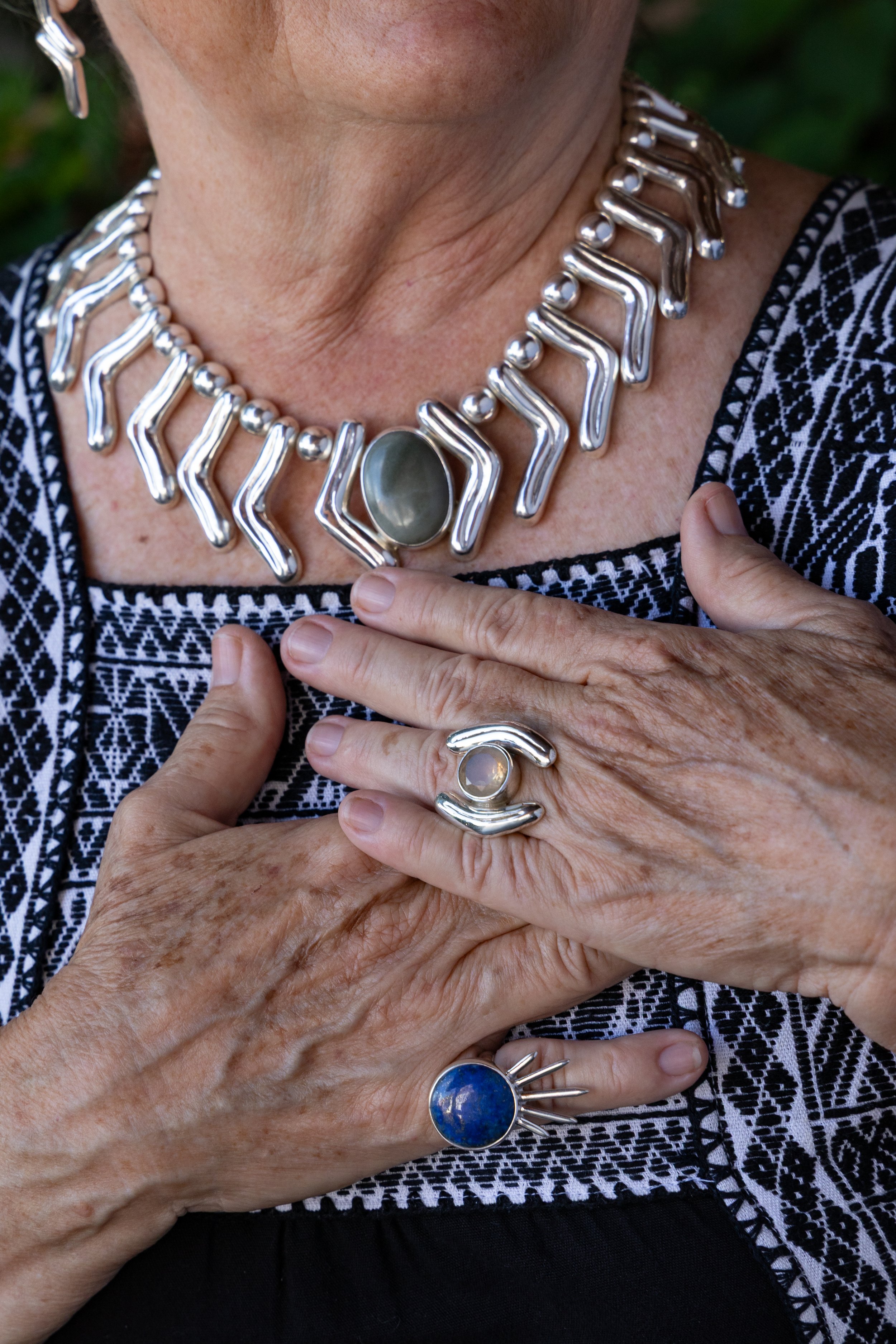 LilyNecklace_LenguaRing_LenguaEarrings_SolRing_LoRes_CarolinaSpratling_Taxco_Mexico_Silver_PhotoMosierAngie--24.jpg