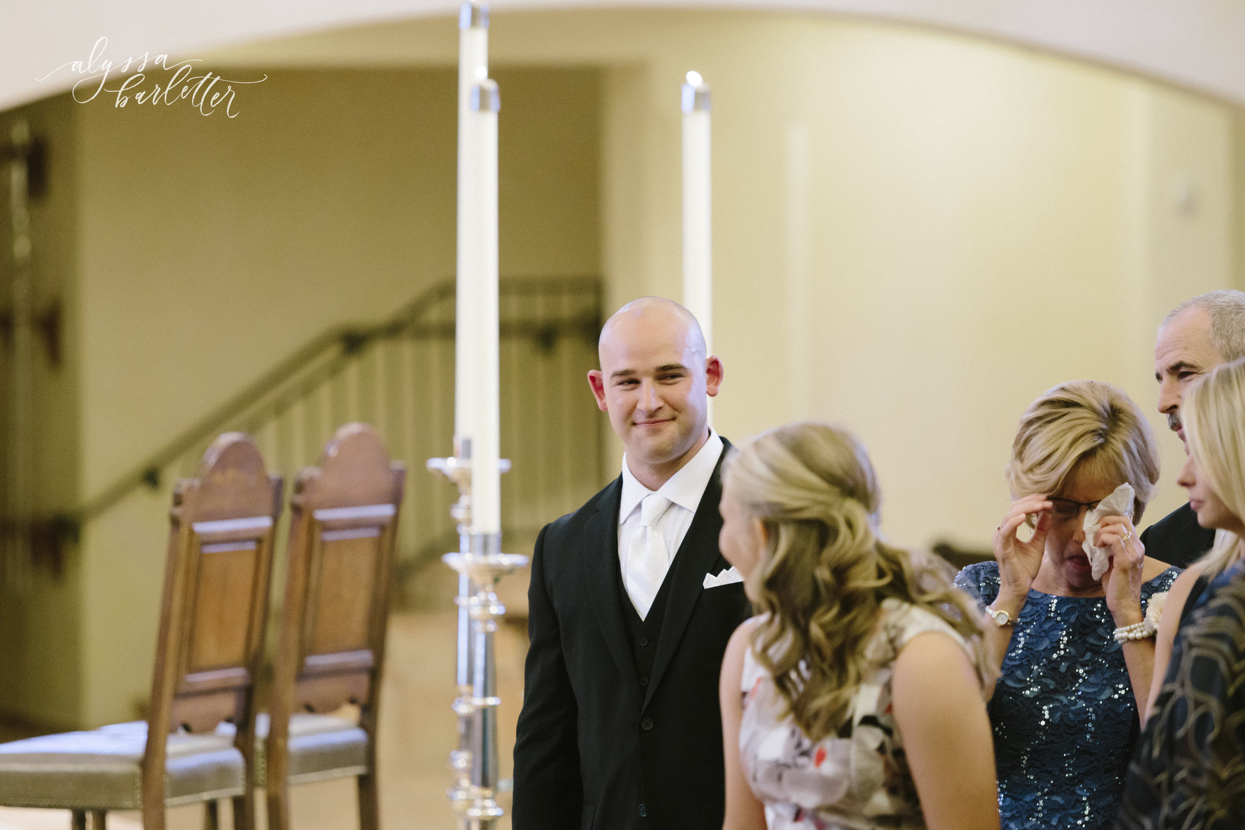 kansas city wedding photography catholic church visitation ceremony groom