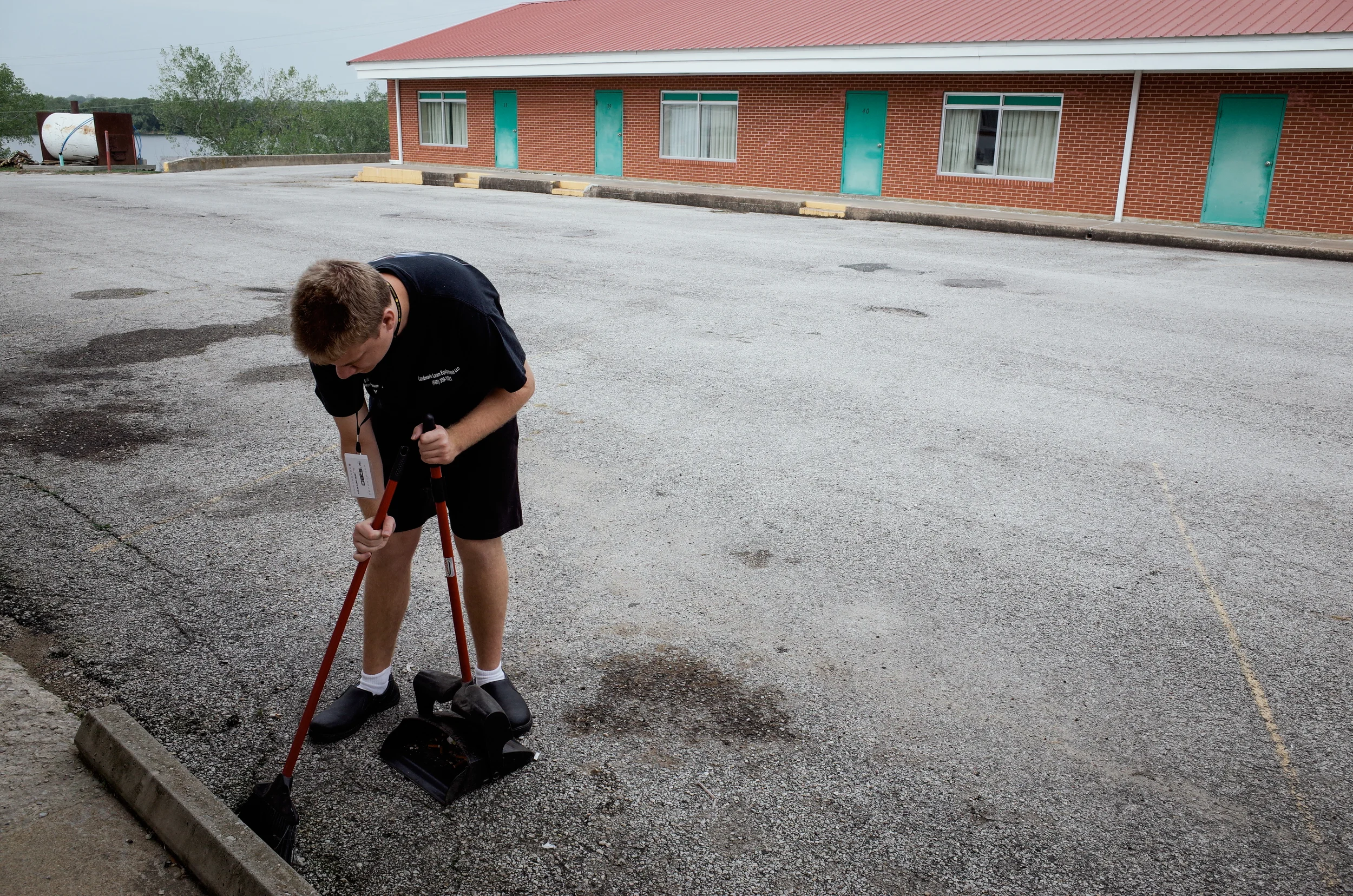 Trenton, Missouri. 2013. Dalton sweeps at Lakeview Motor Lodge where he works one day a week helping in the restaurant and other tasks.