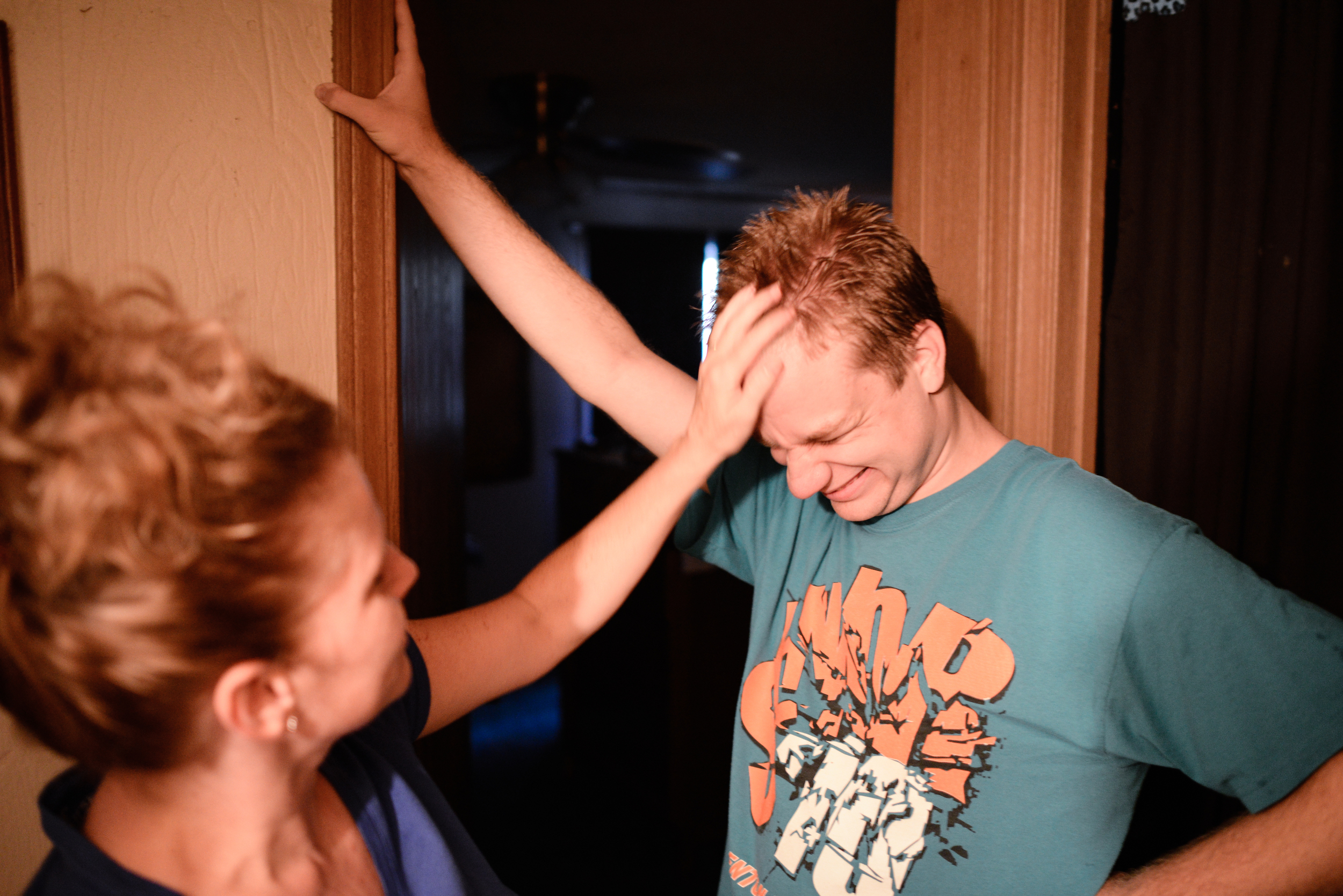  Trenton, Missouri. 2013.  Dalton's mother, Joyce, shows affection before she leaves for work in the morning. 