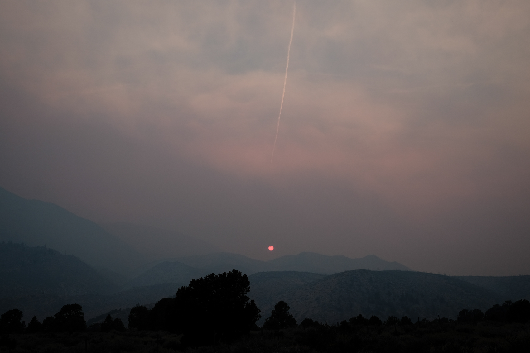 Sunset and wildfire smoke. California. August 2015.