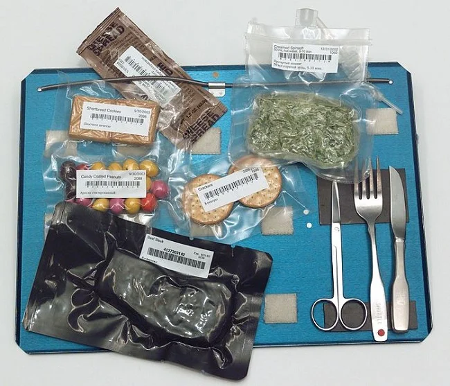 “That creamed spinach looks delicious, good thing I have some surgical scissors to open it up!” - Said no astronaut ever