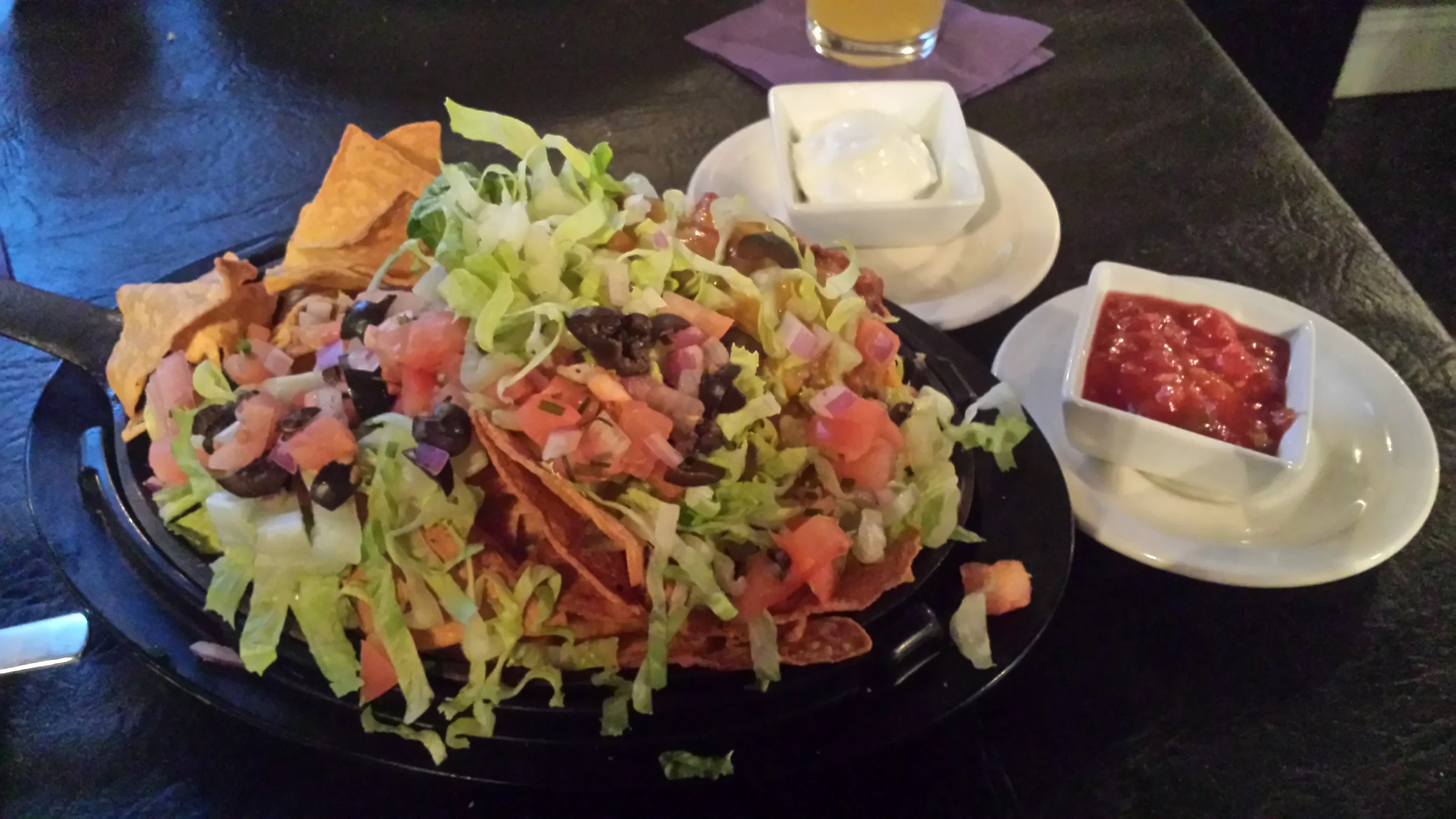 Homemade Chips, Chili, Lettuce, Cheese, Tomatoes, Onions, Olives, Salsa, Sour Cream