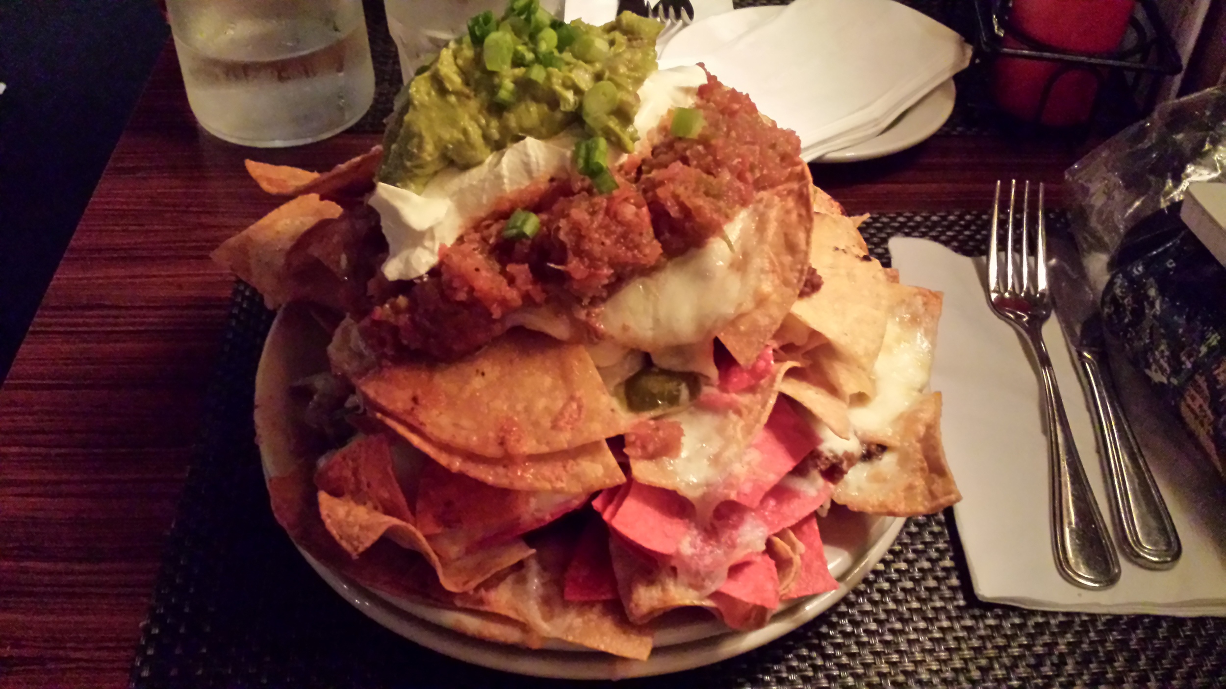 Hand cut tortilla chips, Hereford chili, Monterey jack cheese, jalapeños, sour cream, salsa , g uacamole