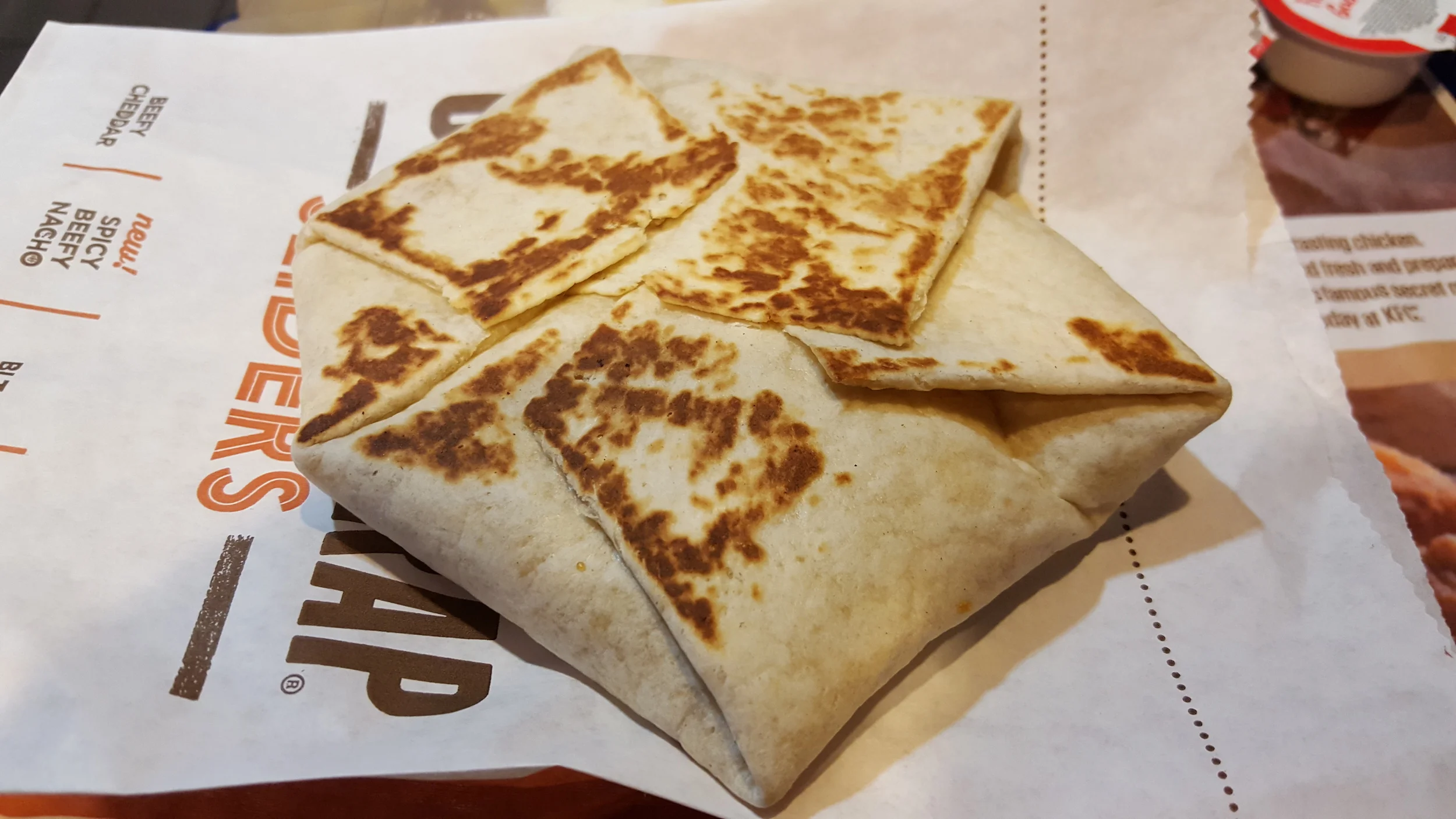 Review Taco Bell Spicy Beefy Nacho Crunchwrap Slider Nachonomics