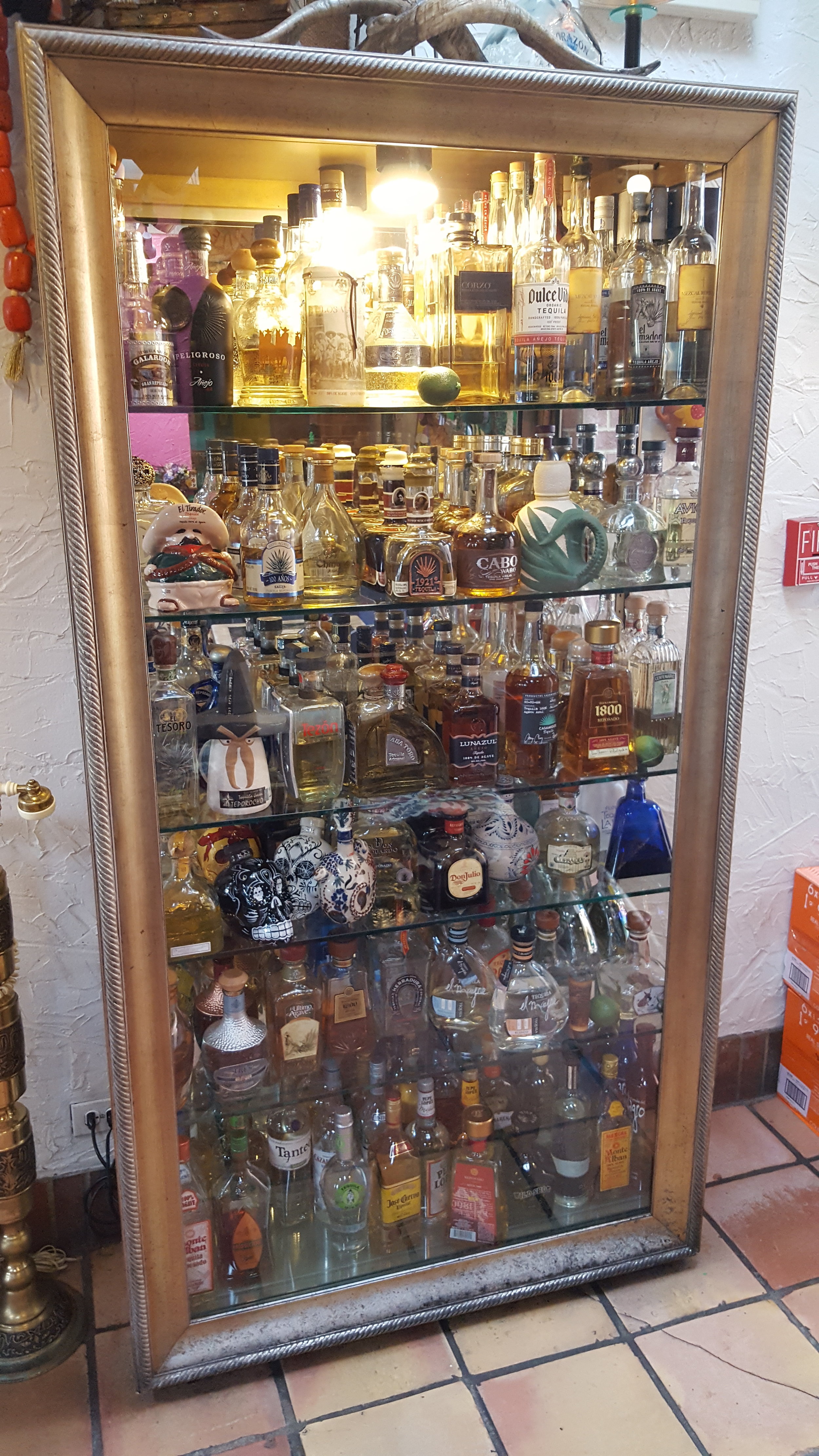One of 3 or 4 tequila display cases.
