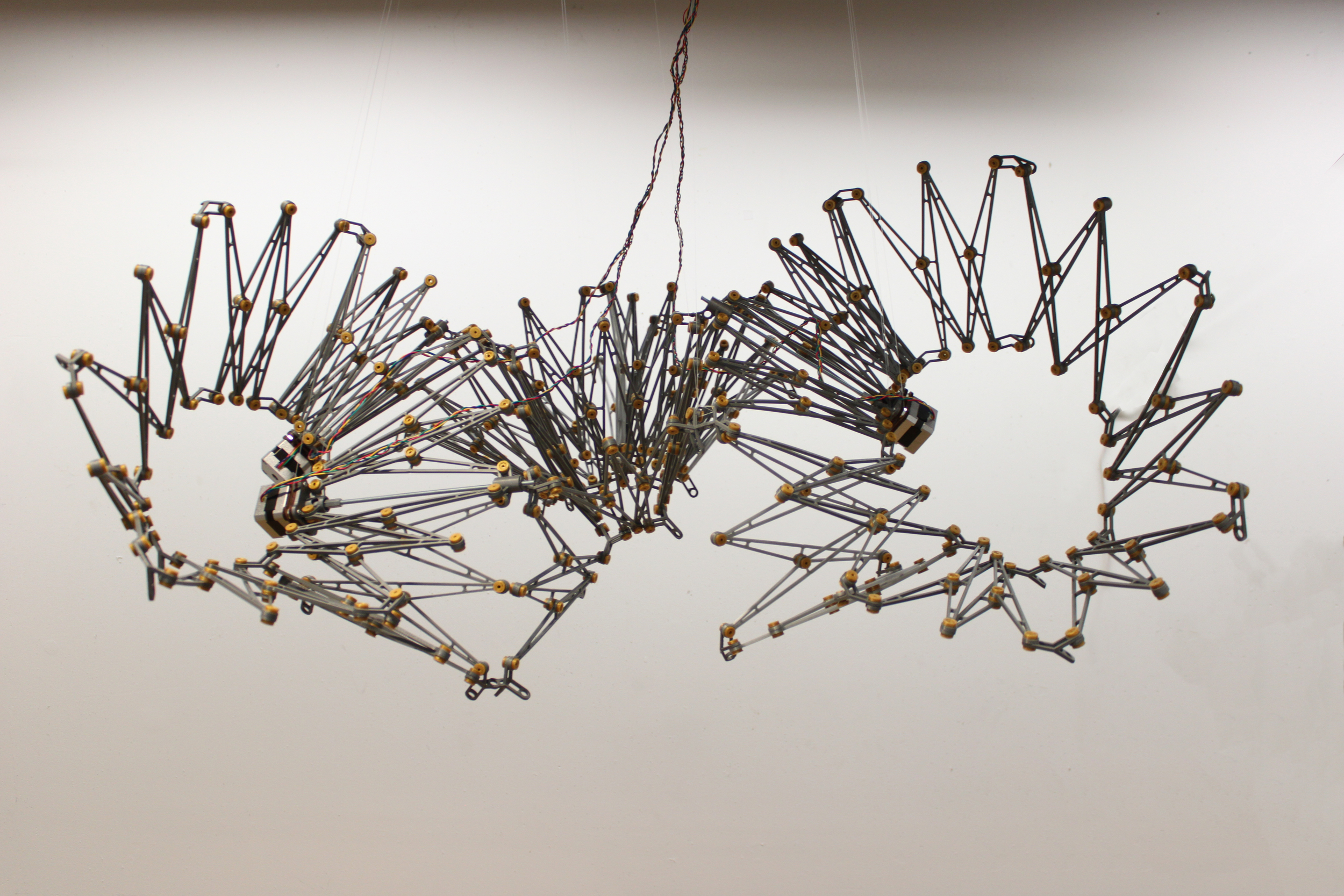  By utilizing space filling geometry, paired with 3d printed trusses and rivet connections, this experimental structure is&nbsp;able to expand to three times its retracted area while maintaining structural integrity. Robotic controllers trigger the s