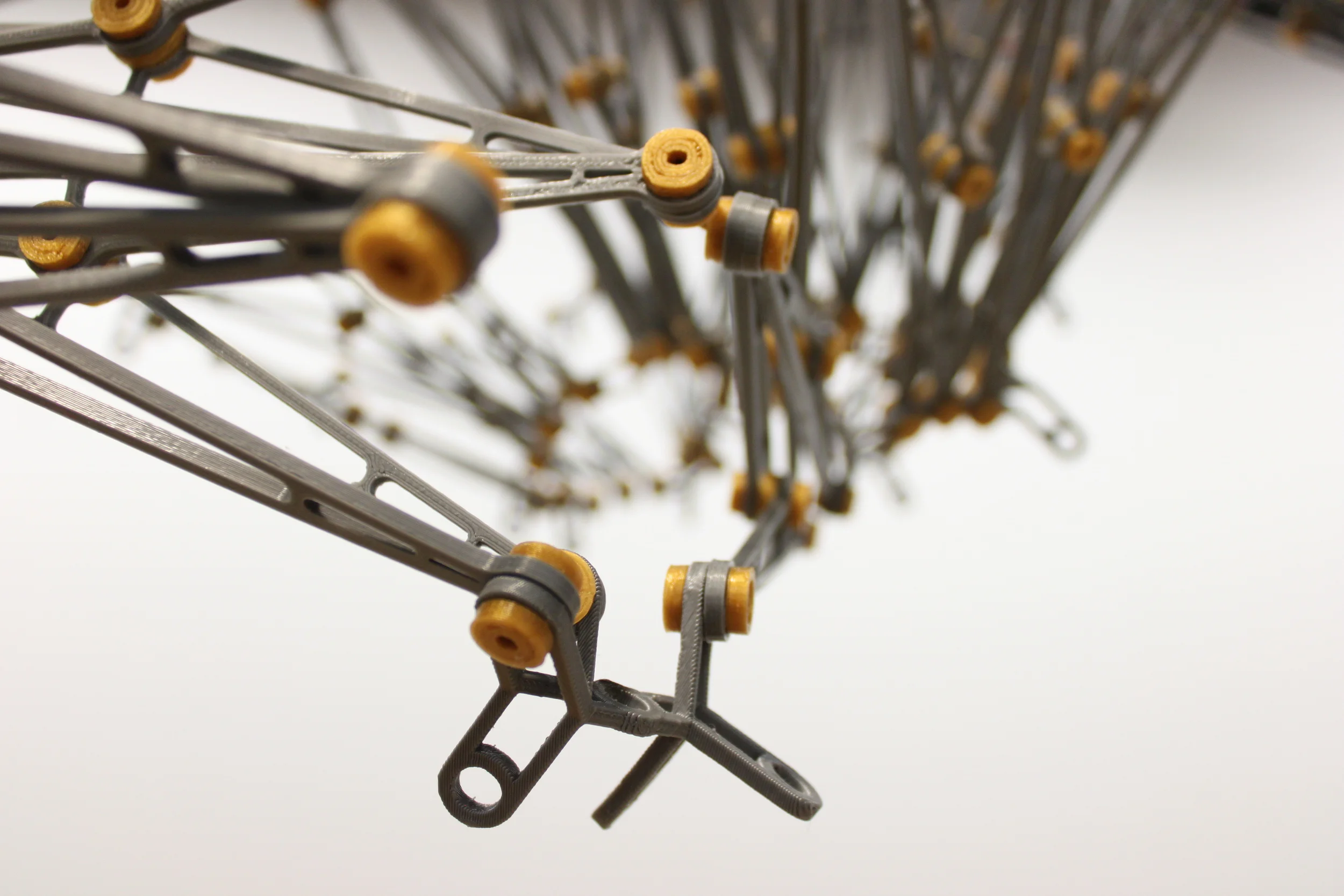  By utilizing 3D printed trusses, connectors, and rivets the need for existing components was eliminated and the entire system was able to be designed in house, creating a high level of design refinement and cost efficiency. 