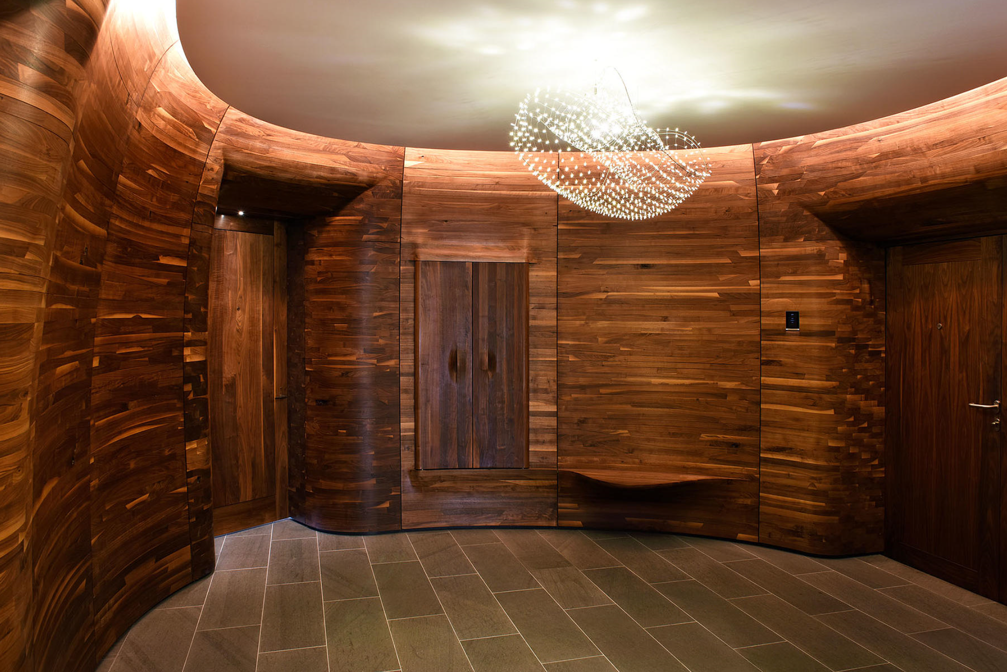 This installation forms the center of an otherwise conventional loft, intertwining itself with the residence’s program, strategically activating key areas within different rooms with the architectural features listed above.