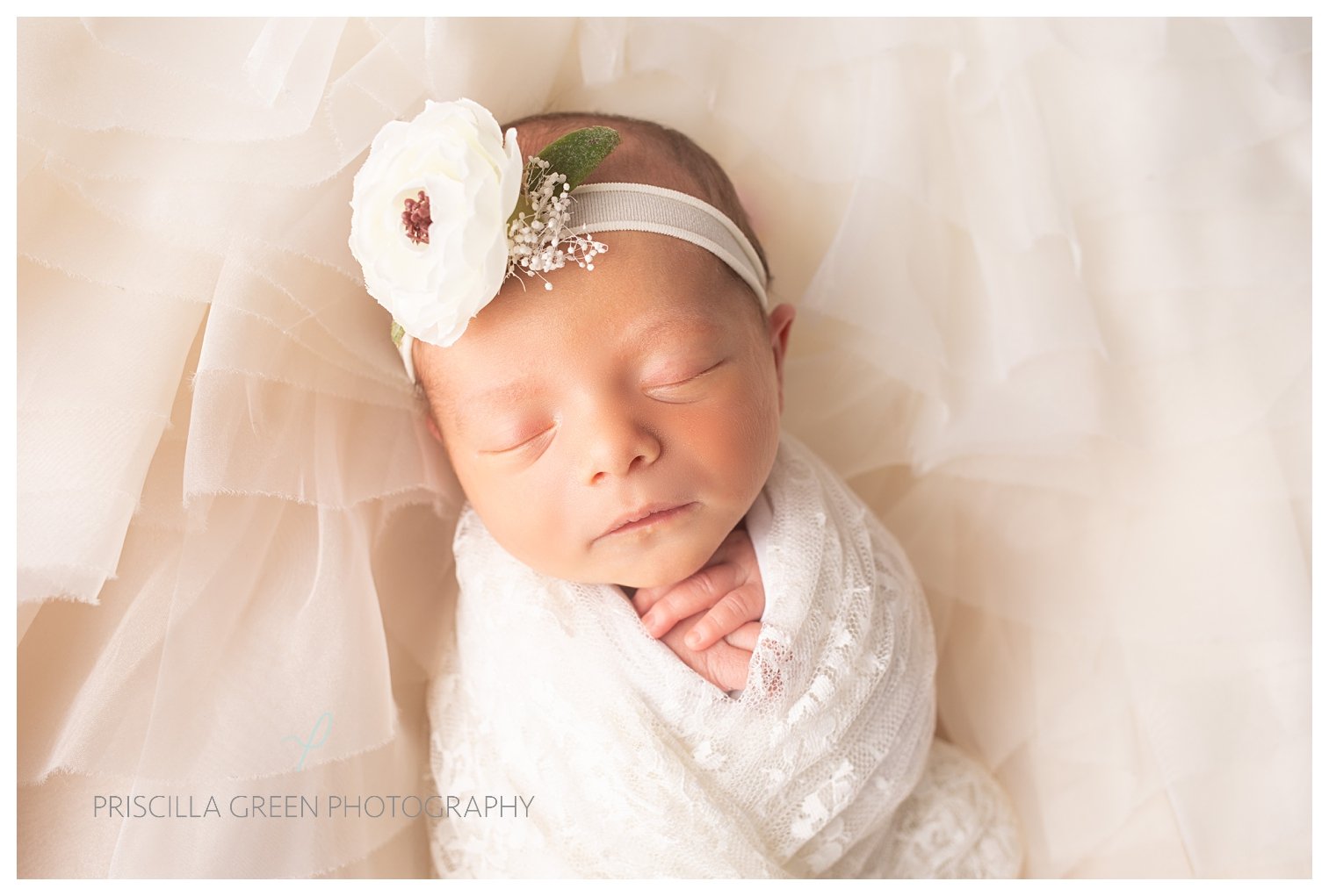  A sweet capture of mother’s newborn baby girl on her wedding dress. We love to incorporate sentimental items into clients session. 