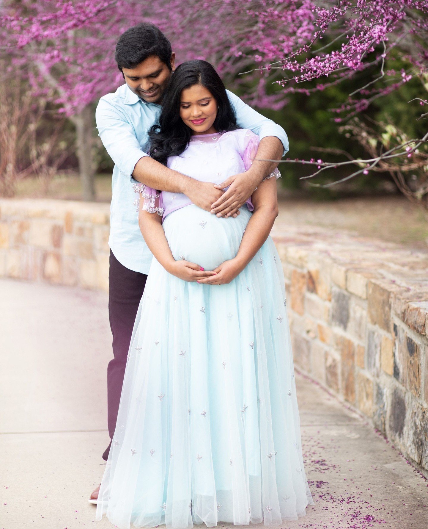 Such a beautiful setting for these expecting parents!⁠
⁠
It's the perfect time to schedule your maternity photoshoot!⁠
The flowers are almost done blooming so do not wait 🌸⁠
⁠
Book your maternity photoshoot online link in bio