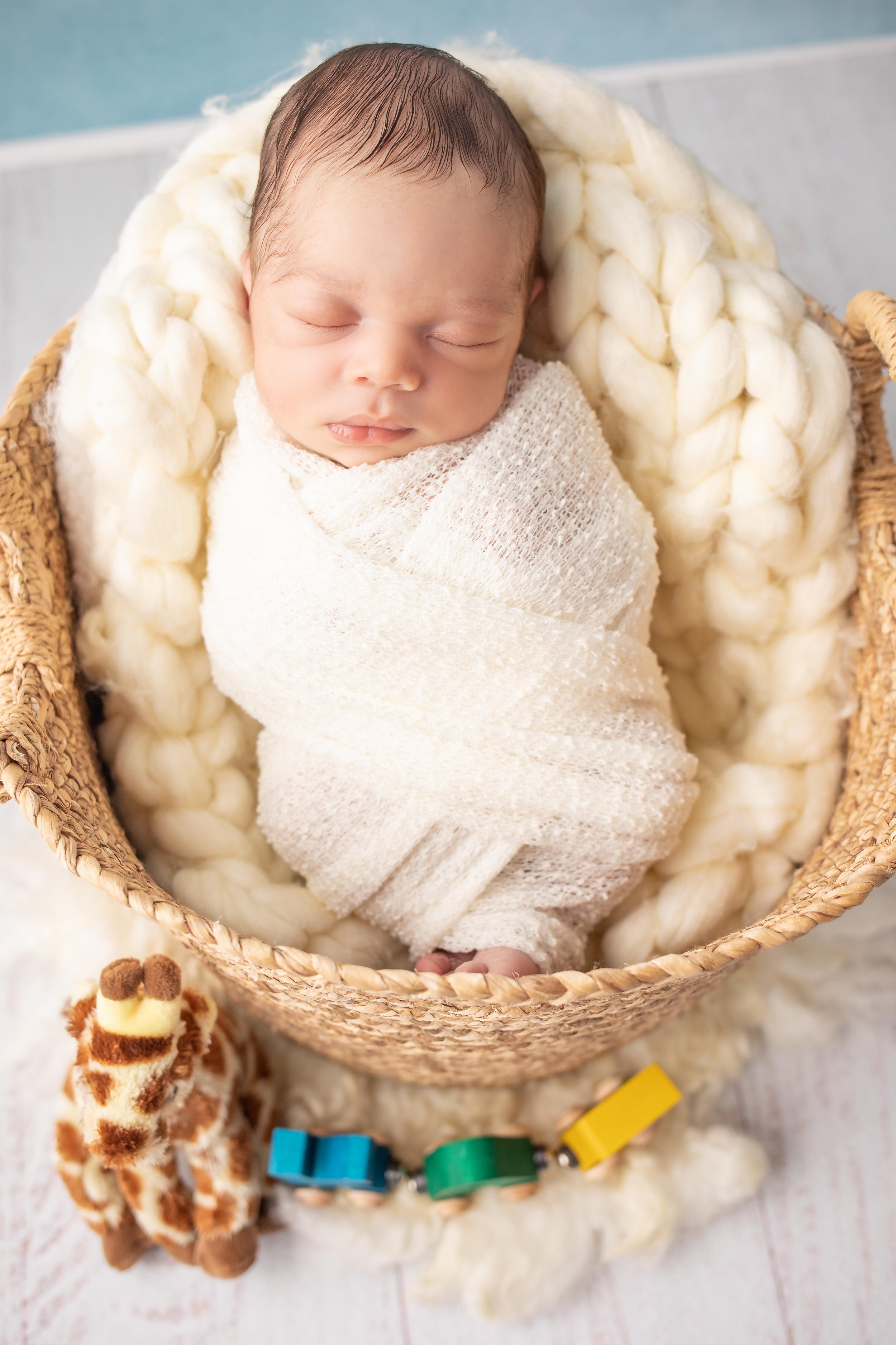 newborn photoshoot with toy train Charlotte, nc