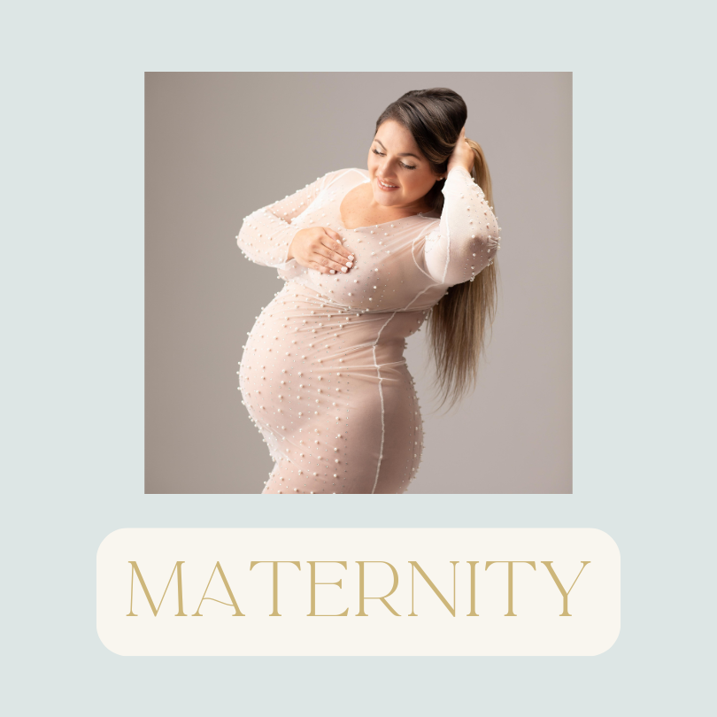 A pregnant woman in a beige dress with pearl embellishments, smiling and touching her belly, with the word "MATERNITY" below.