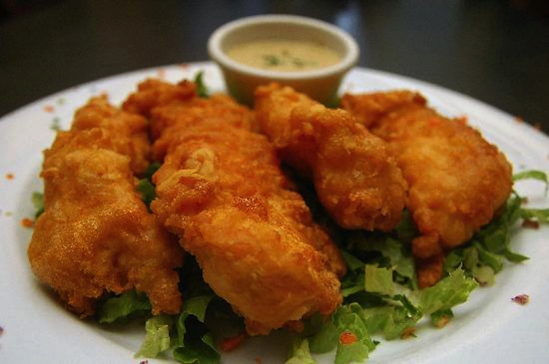 CHICKEN TENDERS Served with Ranch Dressing.