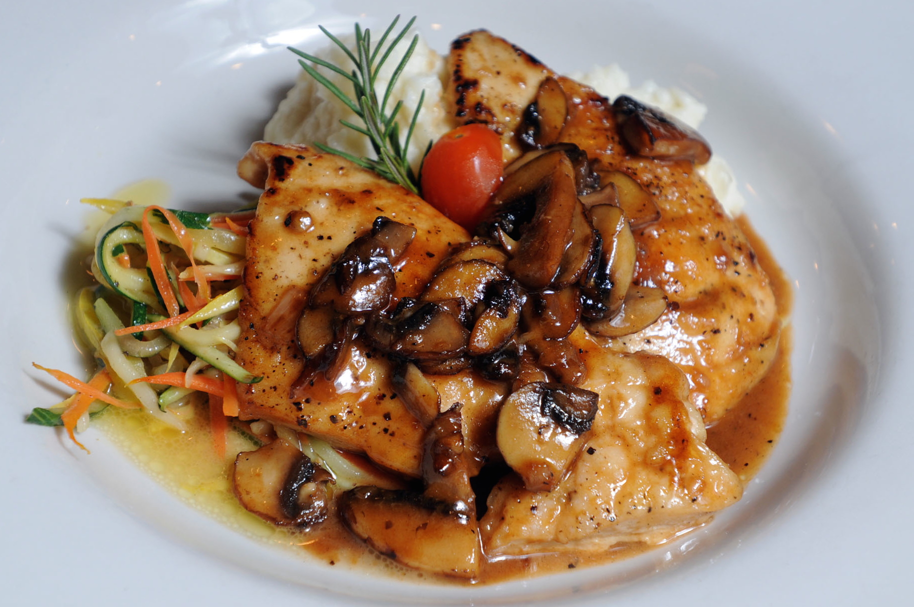 CHICKEN MARSALA Sauteed in a Delicate Marsala Wine Sauce.
