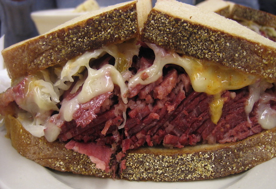 CORNED BEEF SANDWICH Swiss Cheese & Thousand Island Dressing.