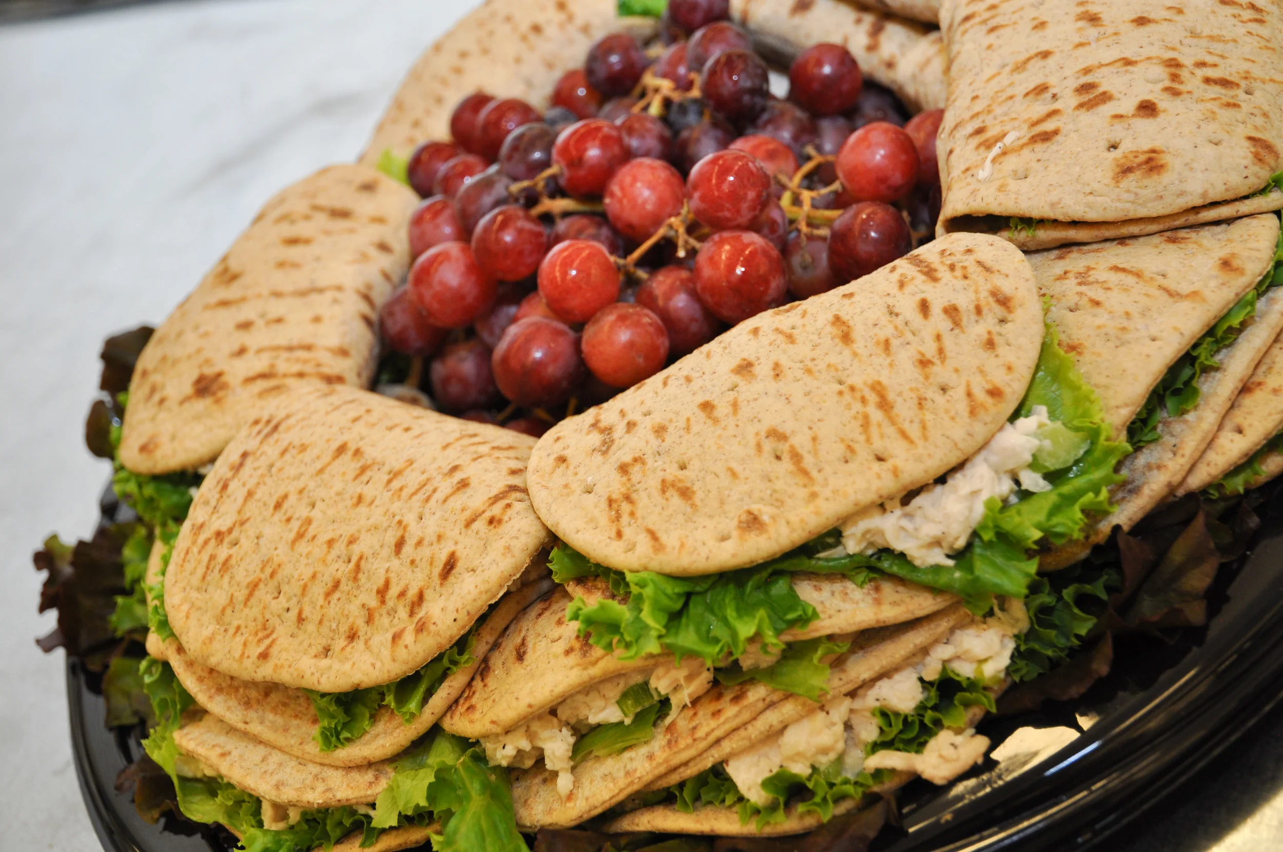Lesa's White Truffle Chicken Salad on Whole Wheat Pitas.